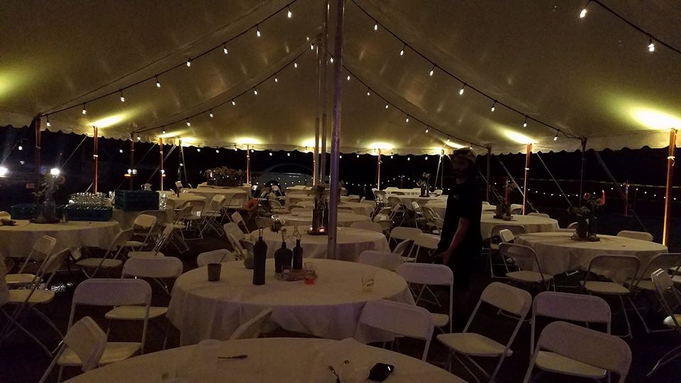 Tent wedding lighting at Mont Du Lac. Up lighting in yellow.