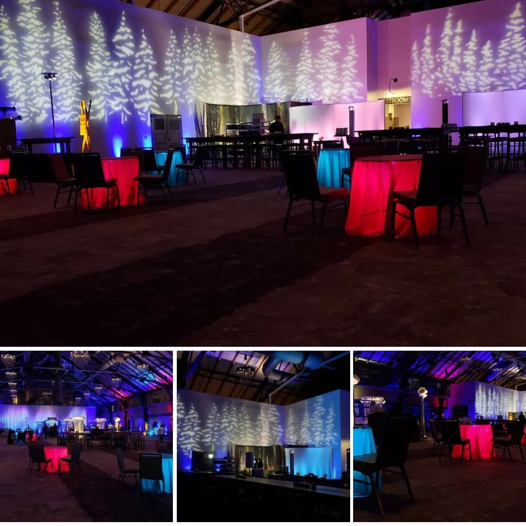 Tree gobos with northern lights and glowing cocktail tables by Duluth Event Lighting.