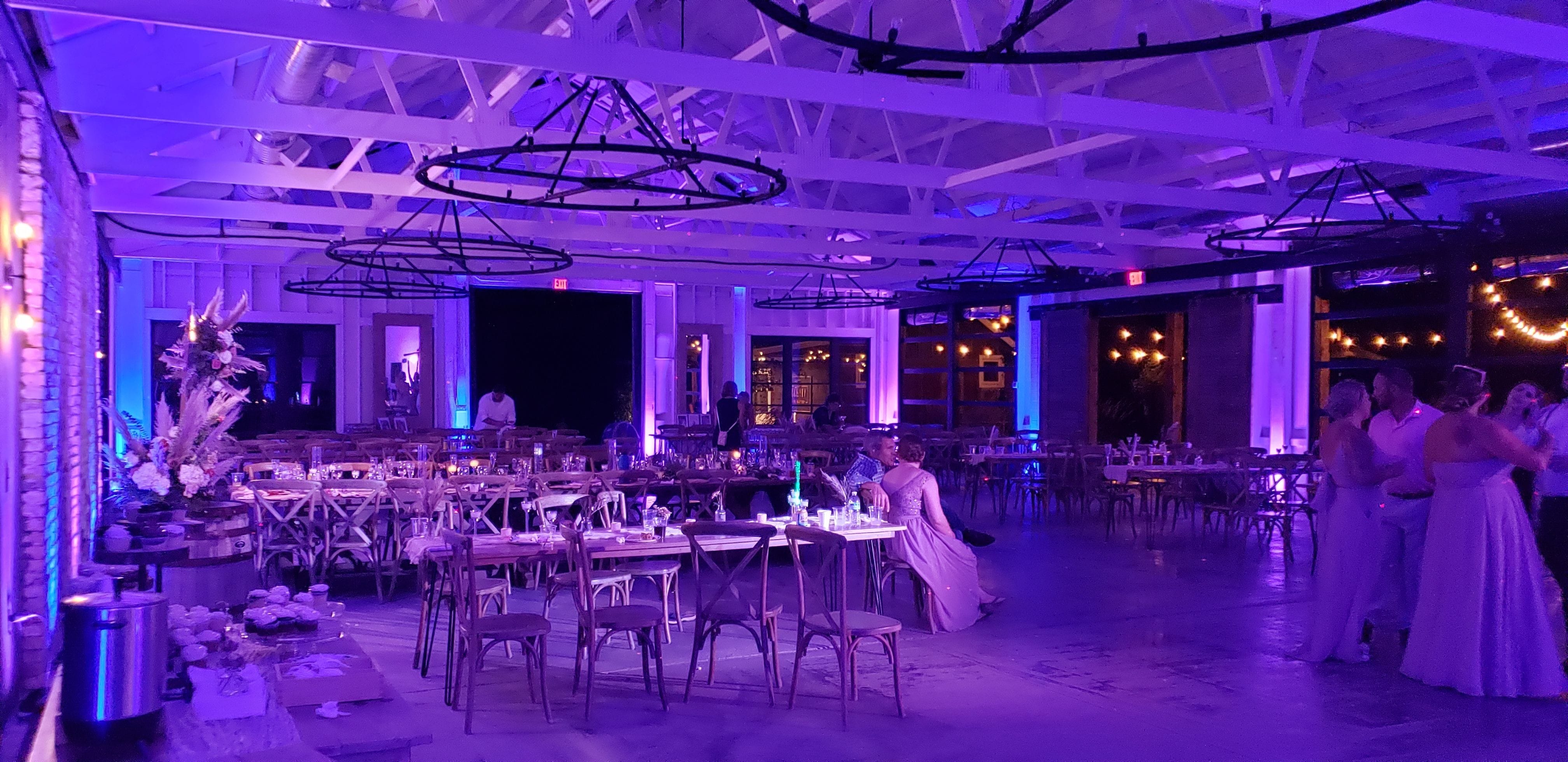 Wedding lighting at the Grainary with blue and lavender up lighting by Duluth Event Lighting