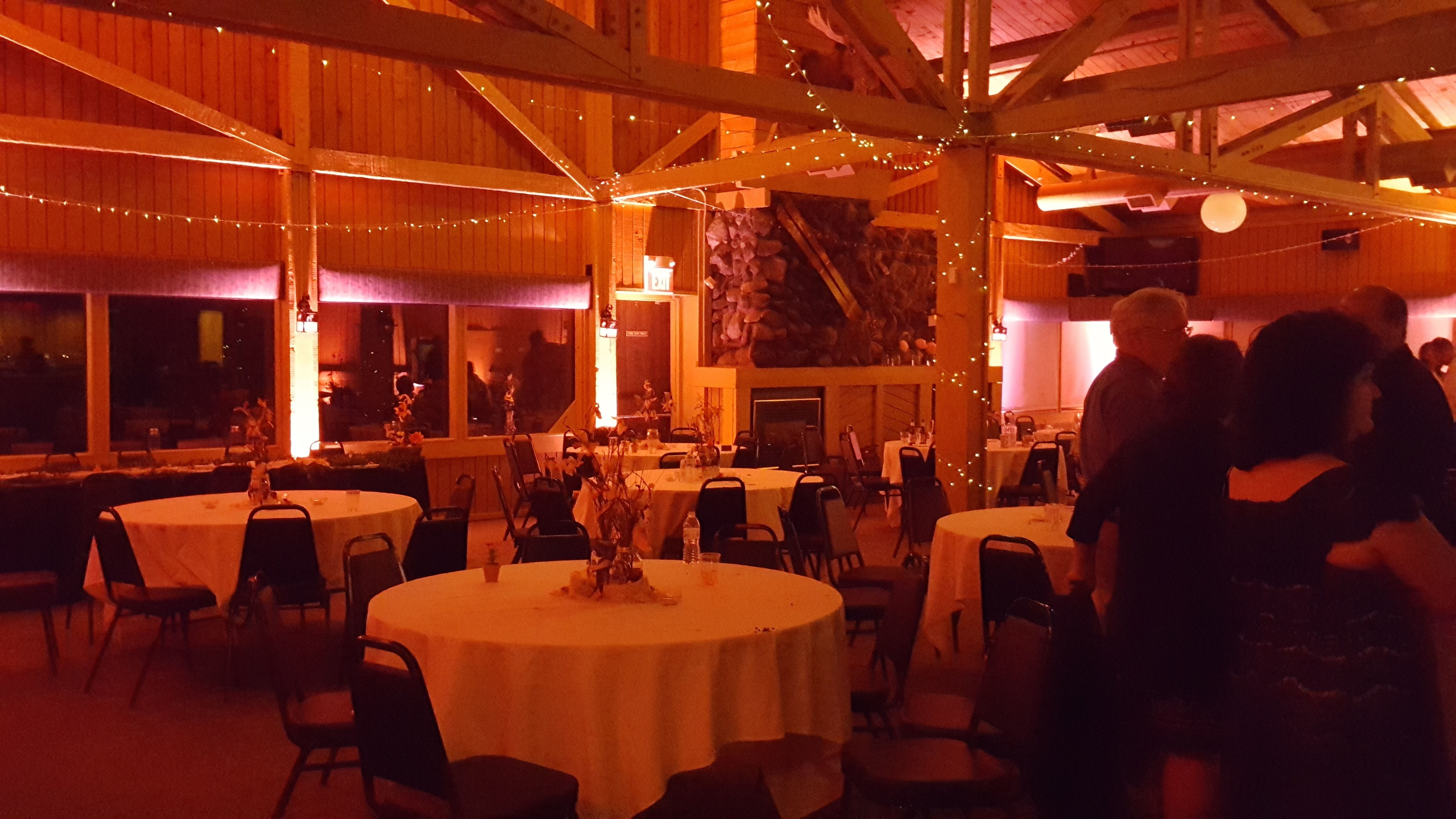 Moose Head Room at Spirit Mountian. Wedding lighting in a peach/coral