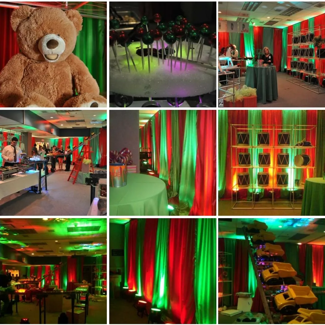 A Christmas party themed Santa's Workshop with red and green up lighting by Duluth Event Lighting.