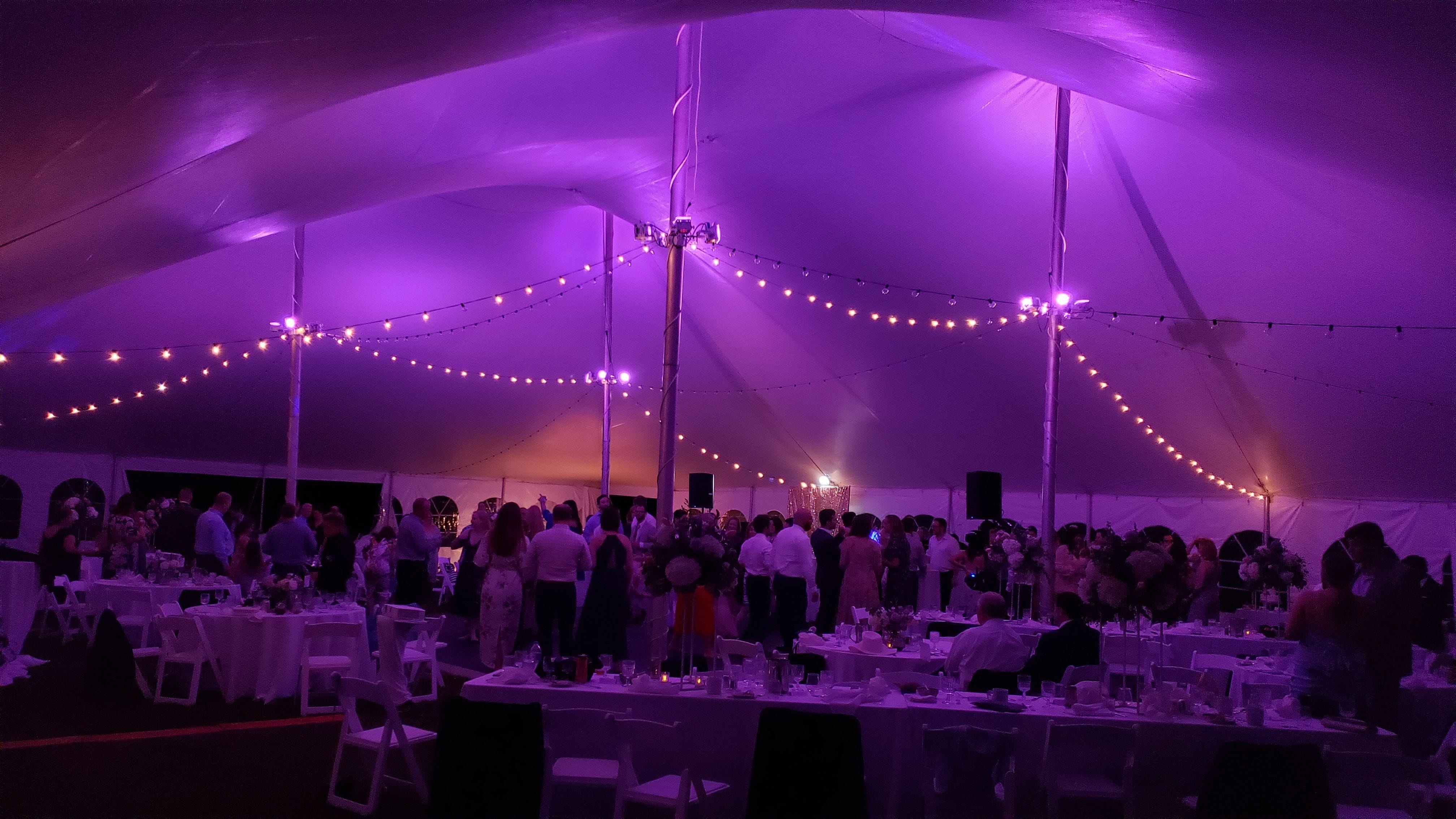 Tent wedding lighting. Purple up lighting, bistro