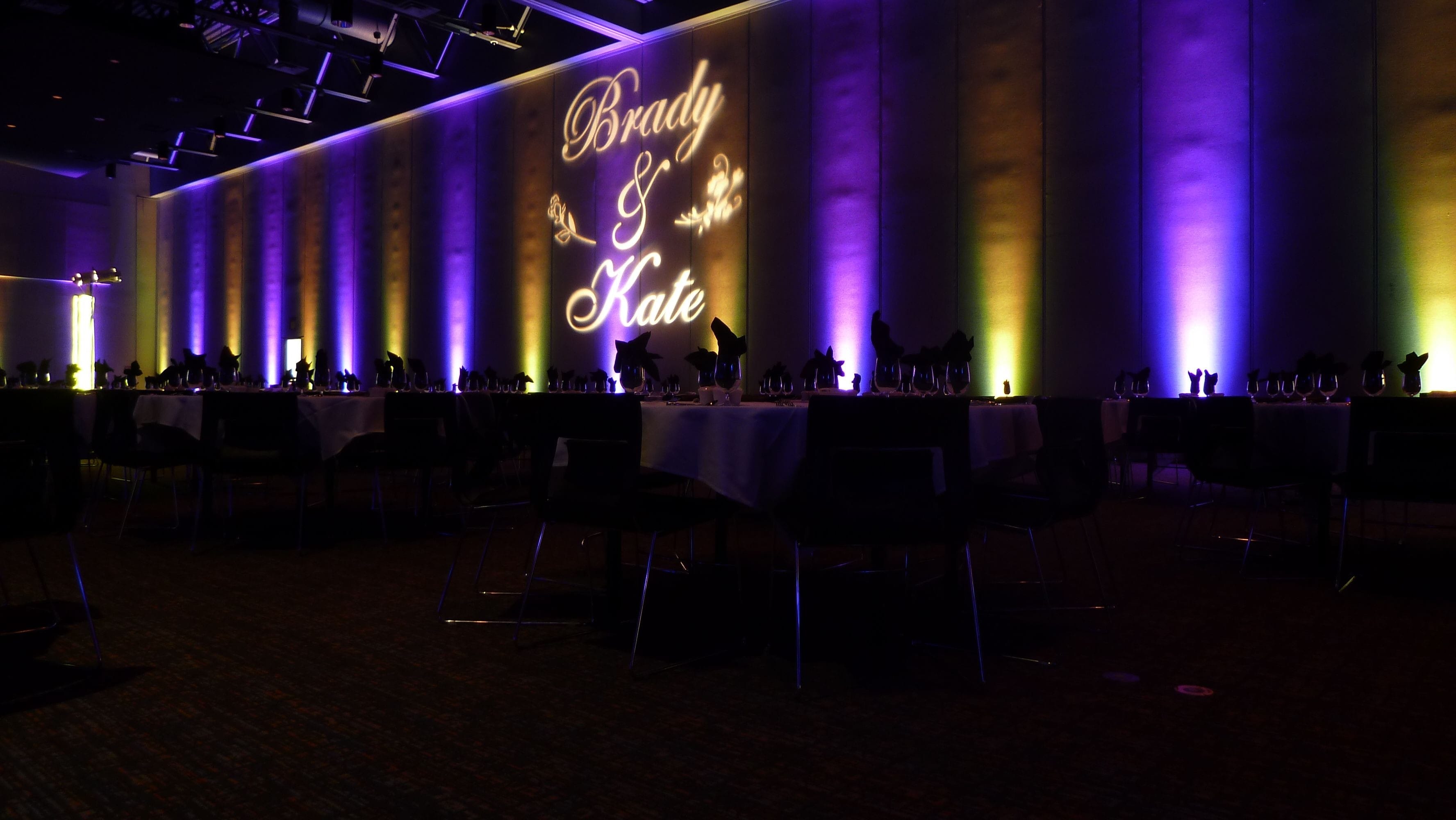 Wedding lighting at Black Bear Casino with a monogram on the wall