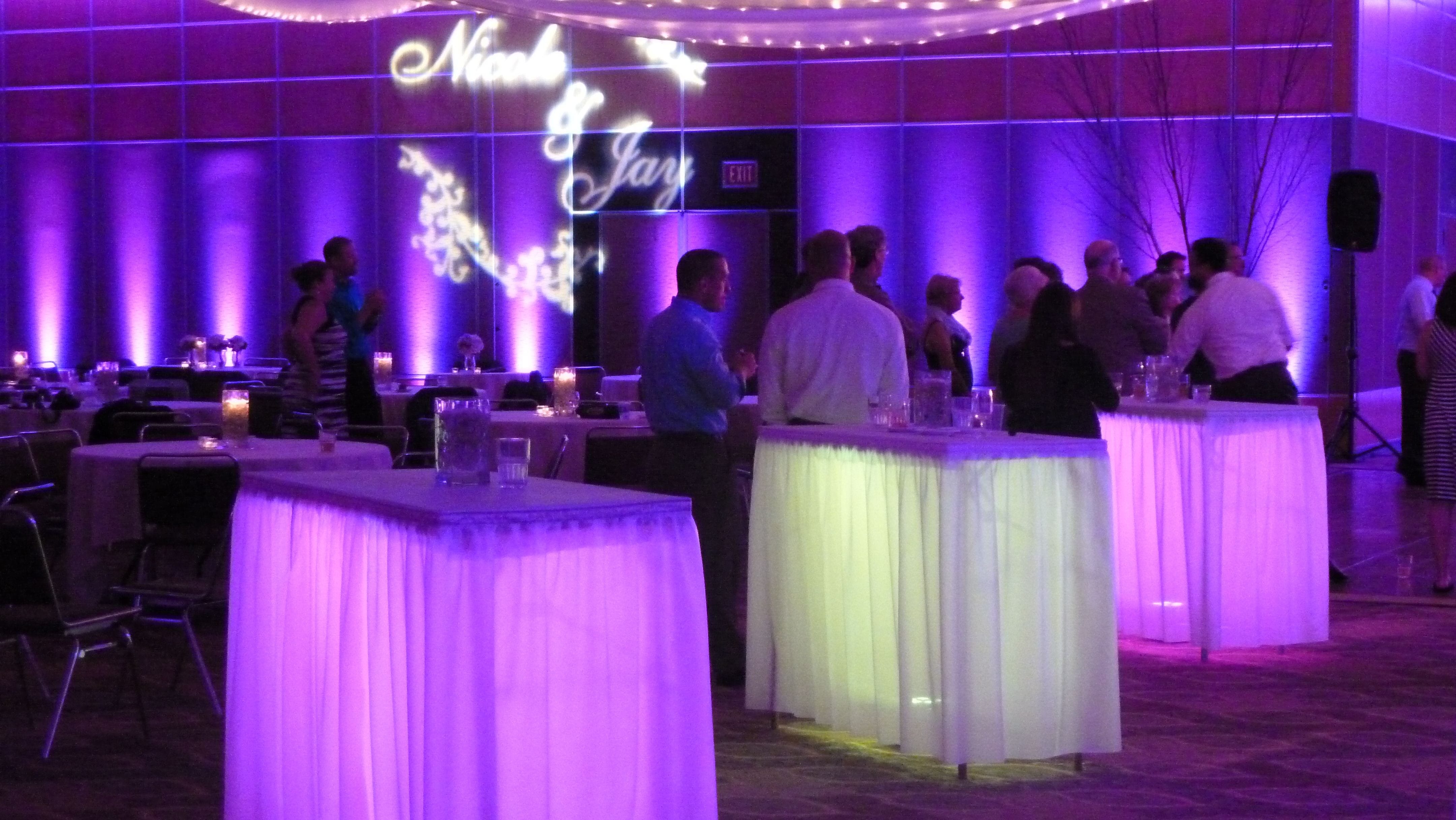 Wedding lighting in the Harbor Side Ballroom at the DECC. Glowing cocktail tables.