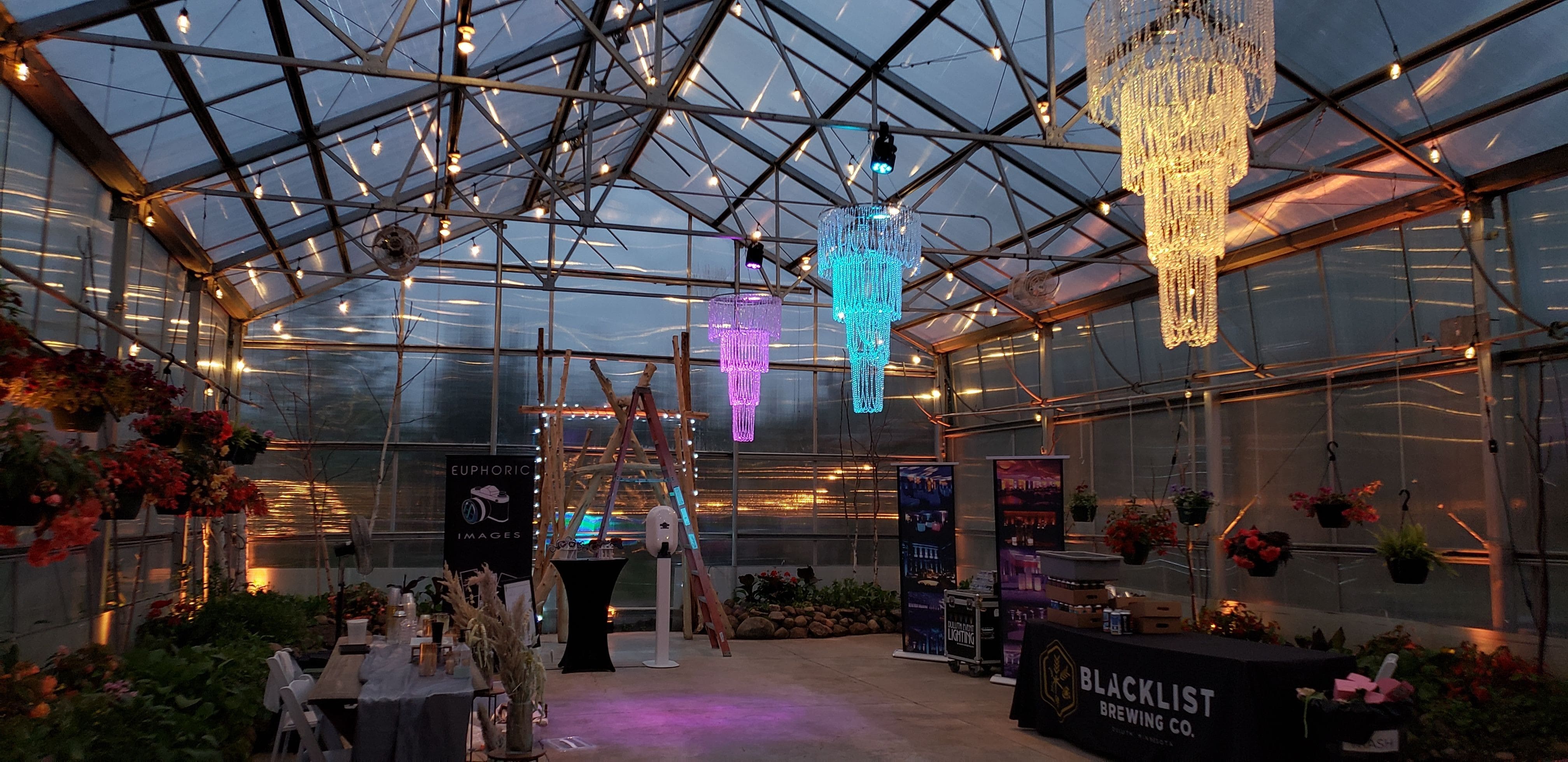Wedding lighting at Sitio Events with chandeliers in the Greenhouse
