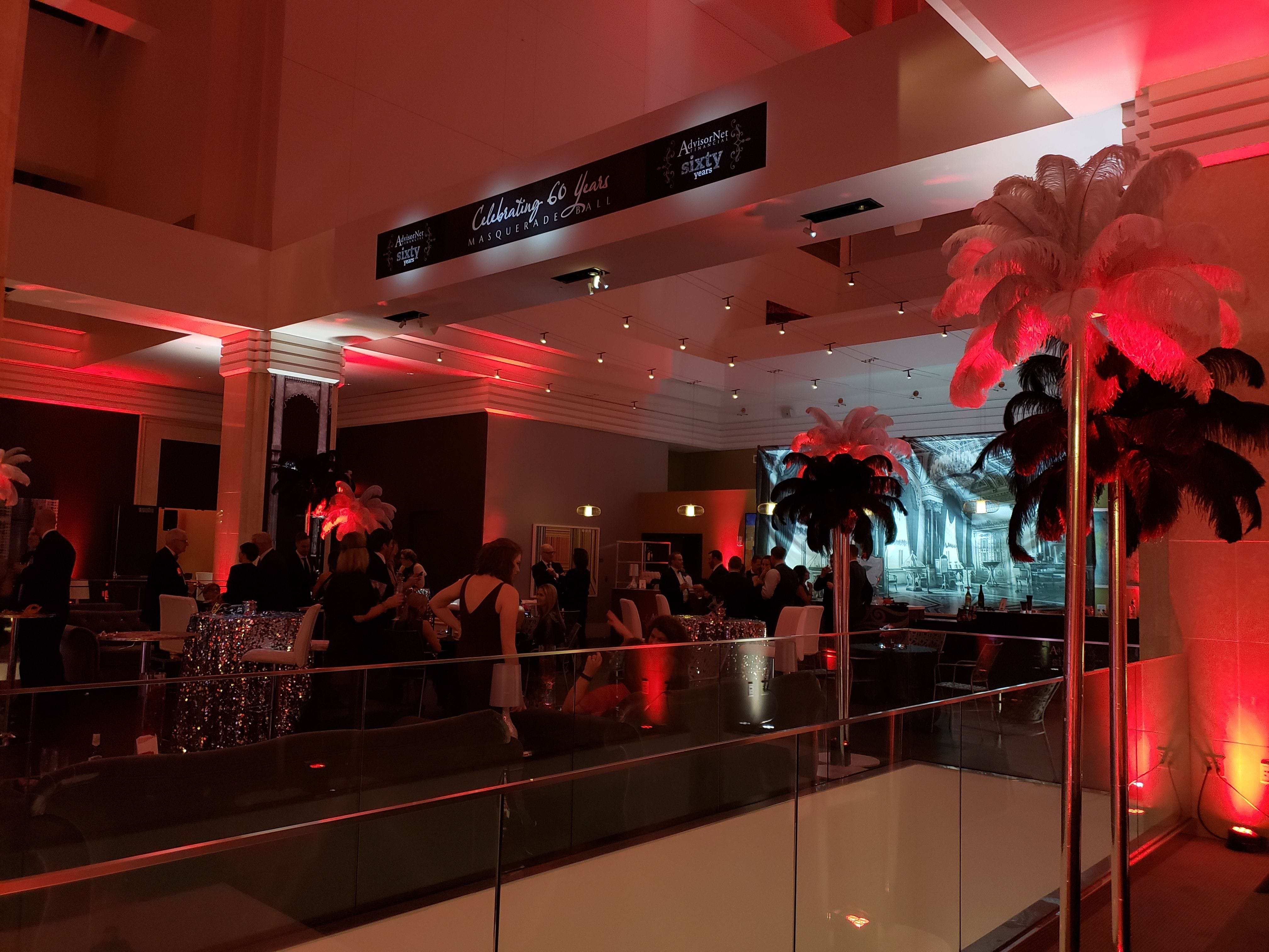 Radisson Blu, Mpls. Lighting for a masquerade ball. Red up lighting, pin spots,backdrop lighting. Decor by Event Lab.