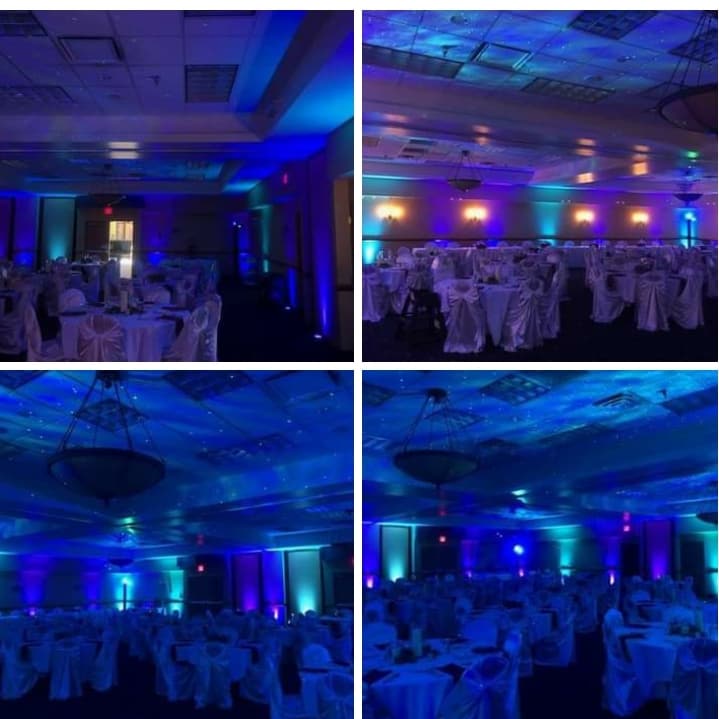 Inn on Lake Superior wedding lighting in teal and blue with northern lights on the ceiling by Duluth Event Lighting.