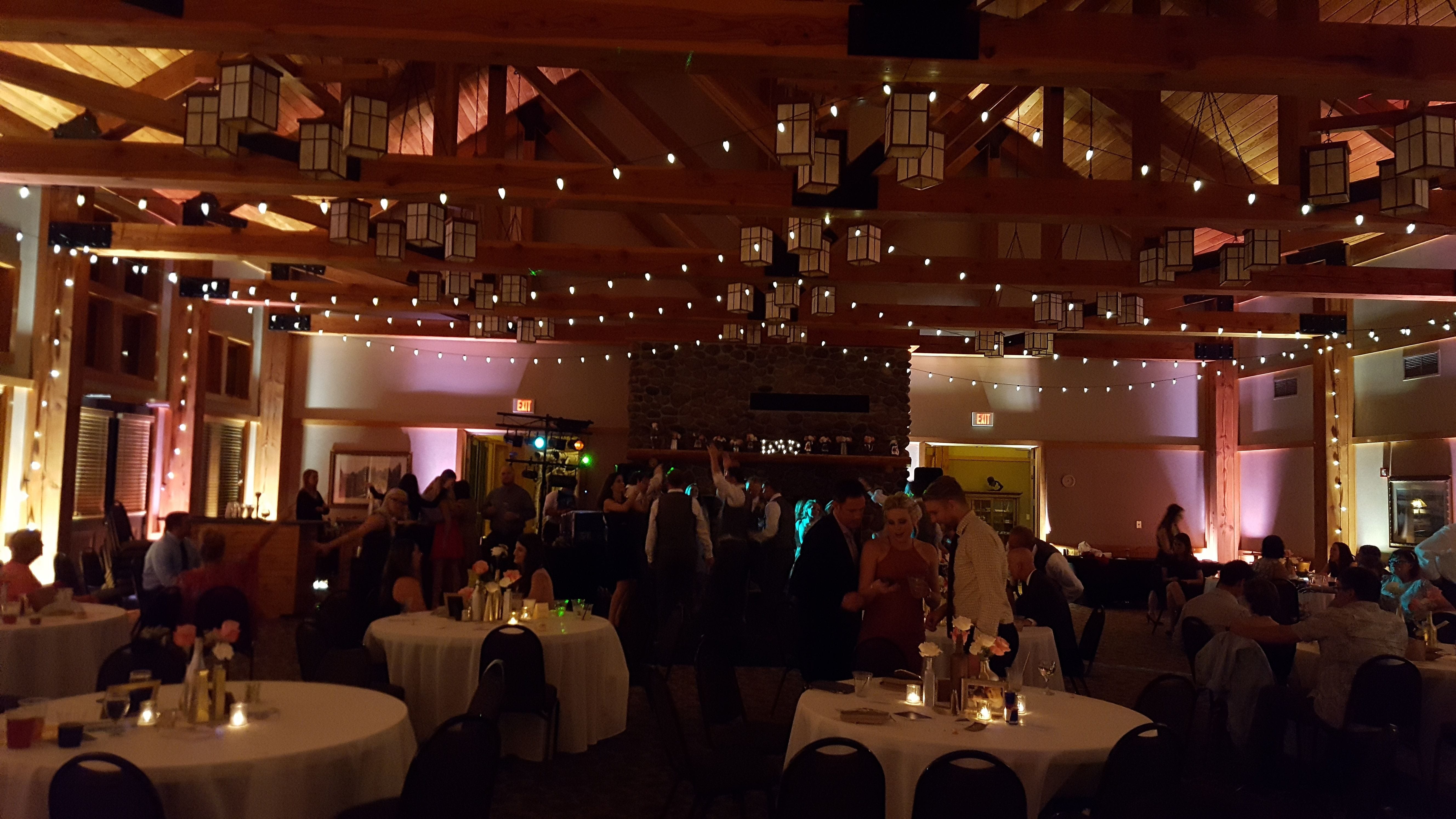 wedding lighting at the Heartwood event center in Trego, WI. Bistro and up lighting provided by Duluth Event Lighting.