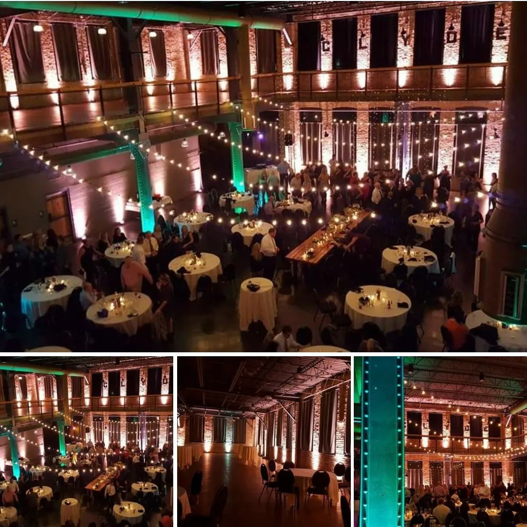 Wedding lighting with peach and mint green up lighting at the Clyde.