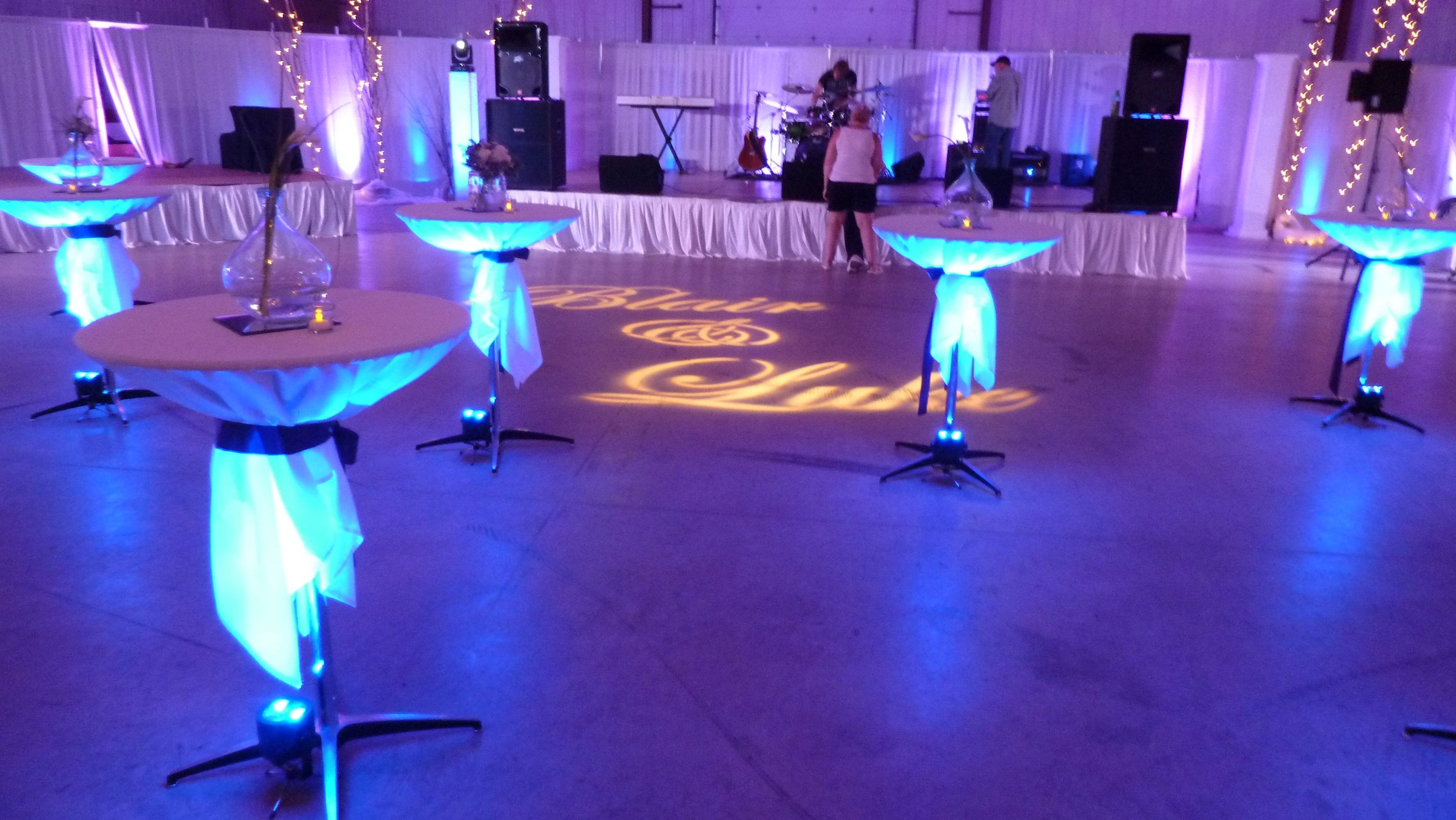 Wedding lighting with glowing cocktail tables