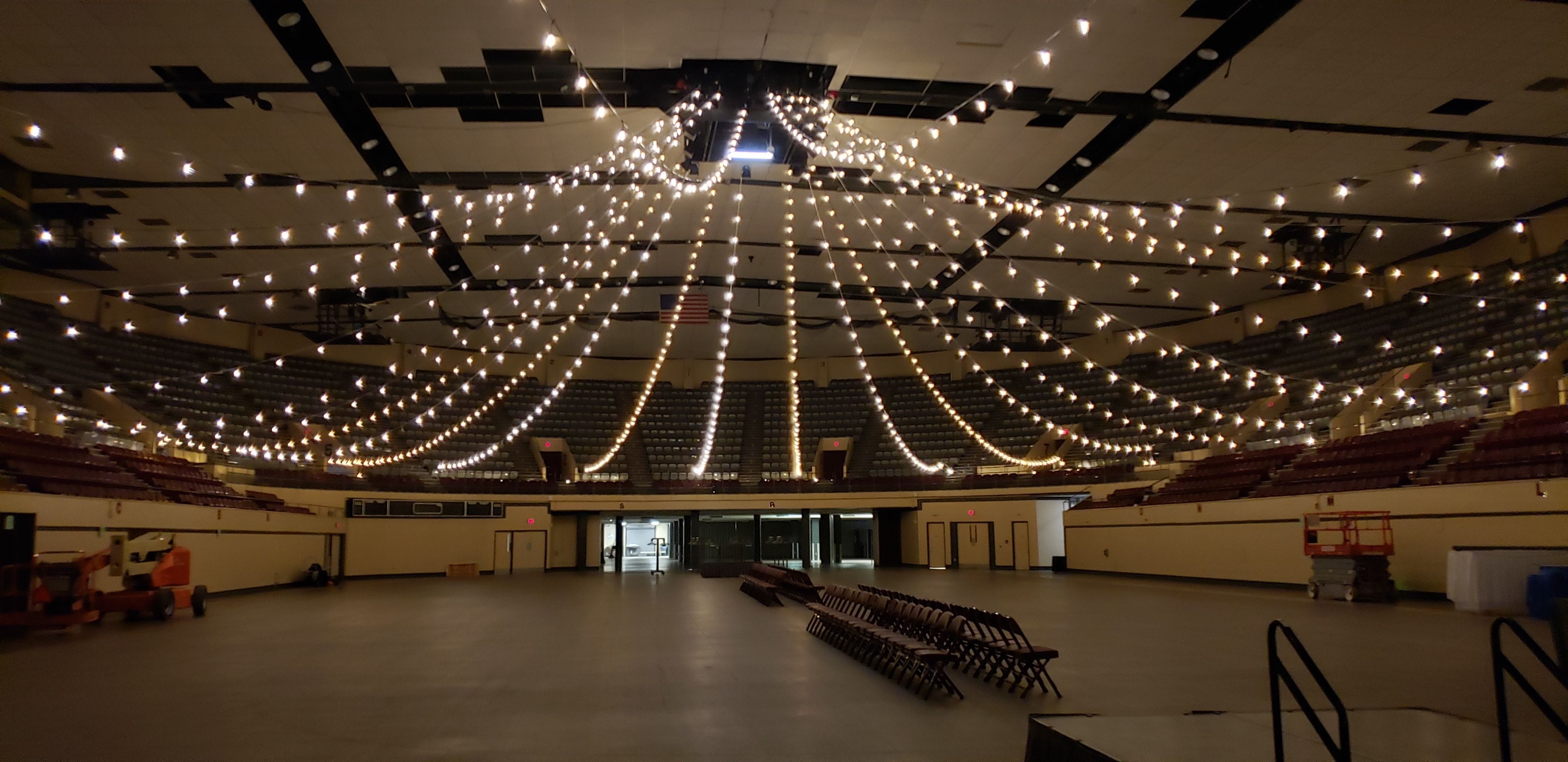 a bistro canopy over a hockey rink at the DECC by Duluth Event Lighting.
