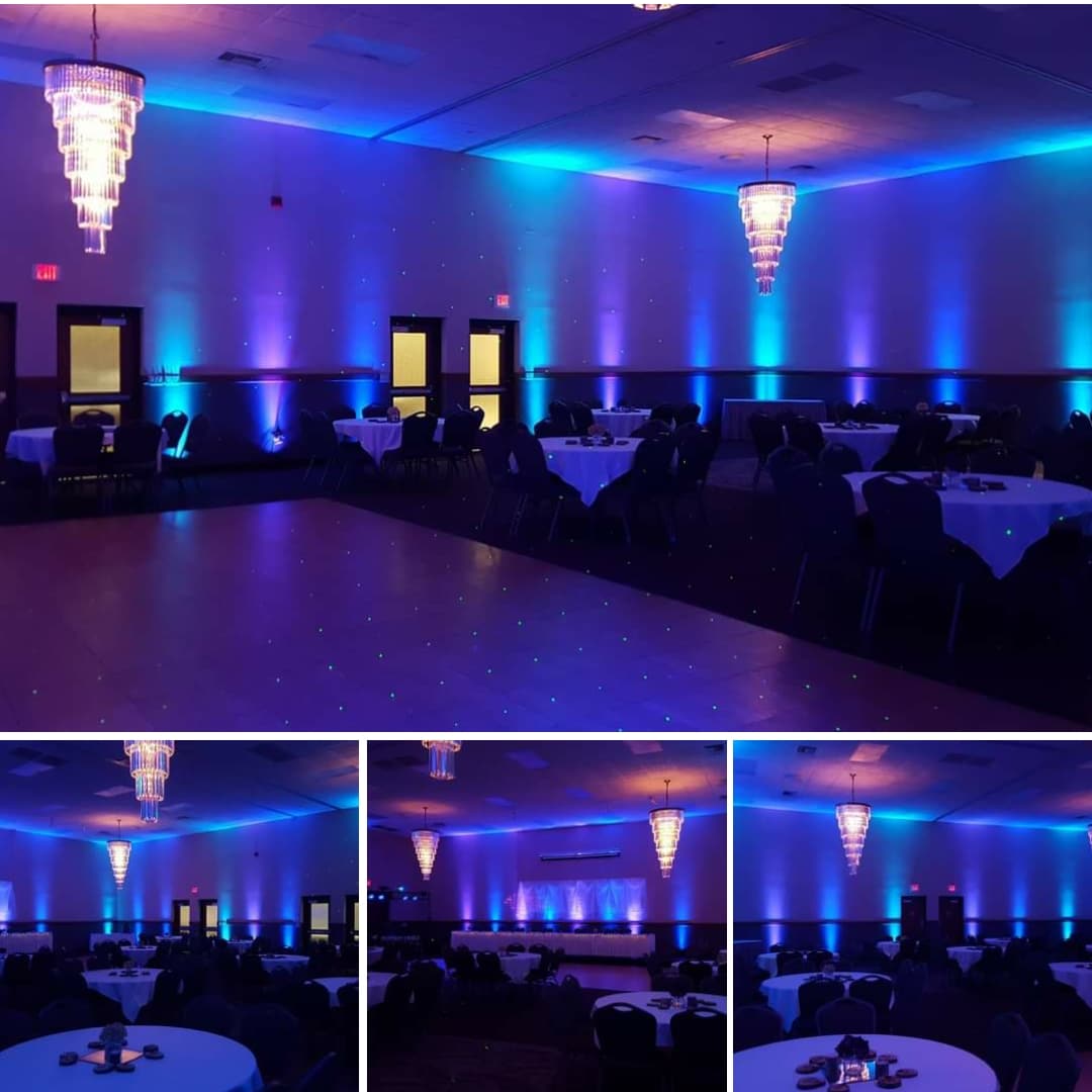purple, blue and teal up lighting for a wedding at Barker's Island.