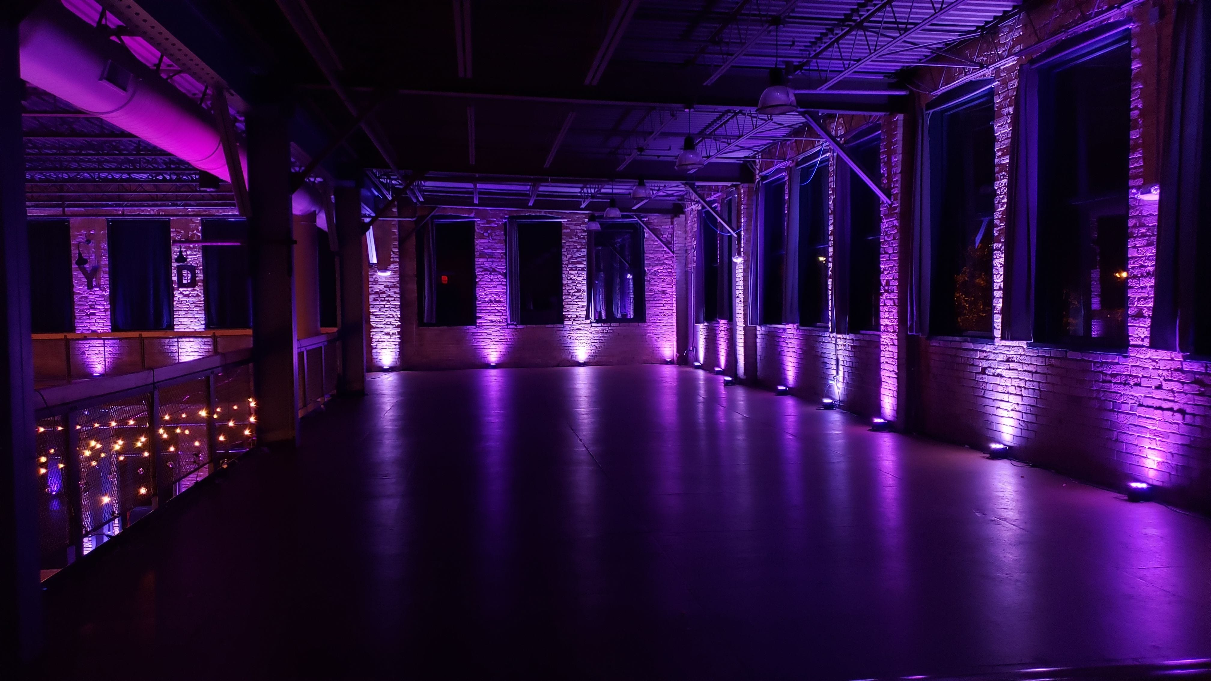 Wedding lighting in two tone lavender at Clyde Iron Works.