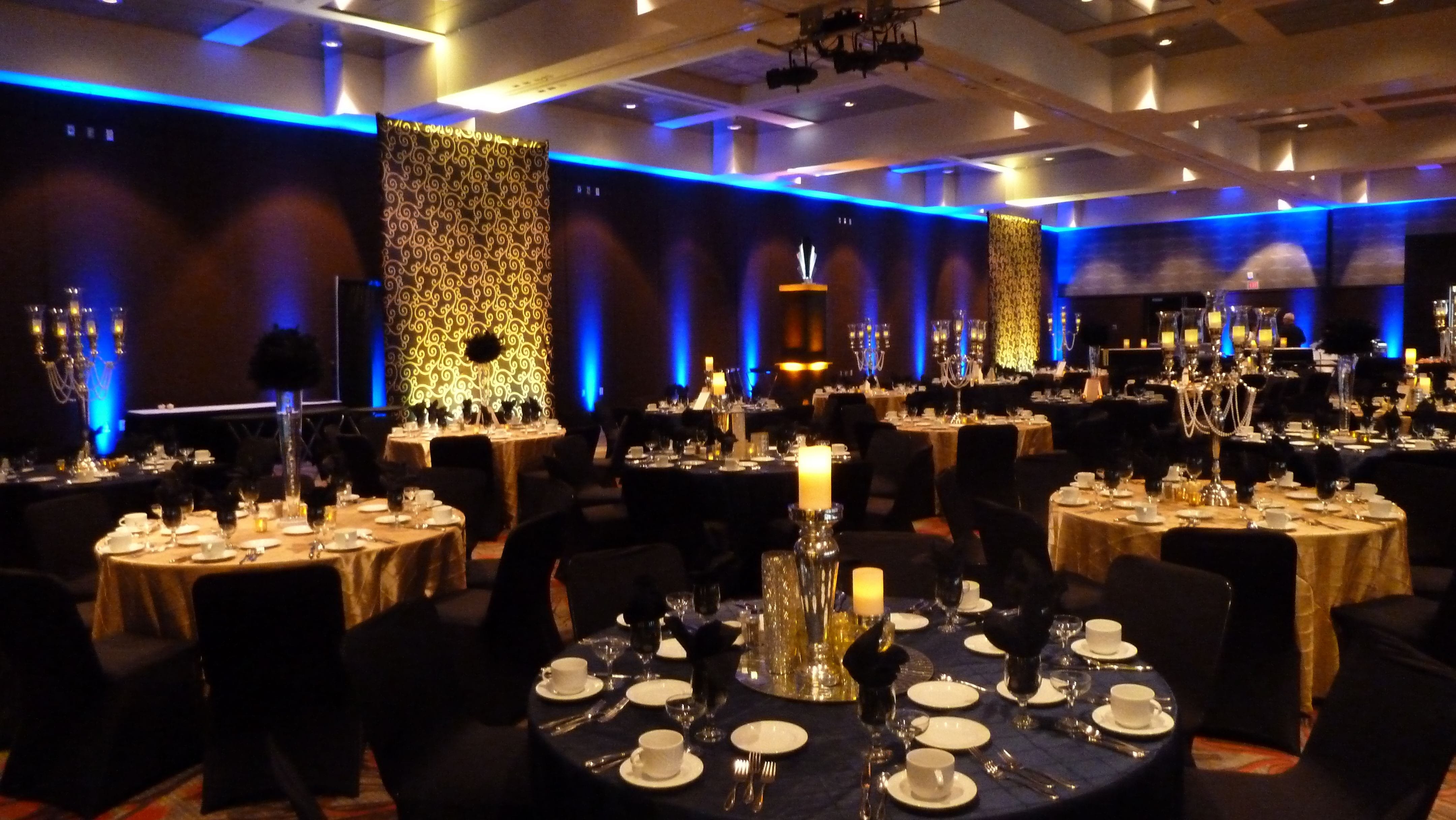 DECC, Lake Superior Ballroom. Art Deco party. Blue and gold up lighting. Decor by Event Lab LLC