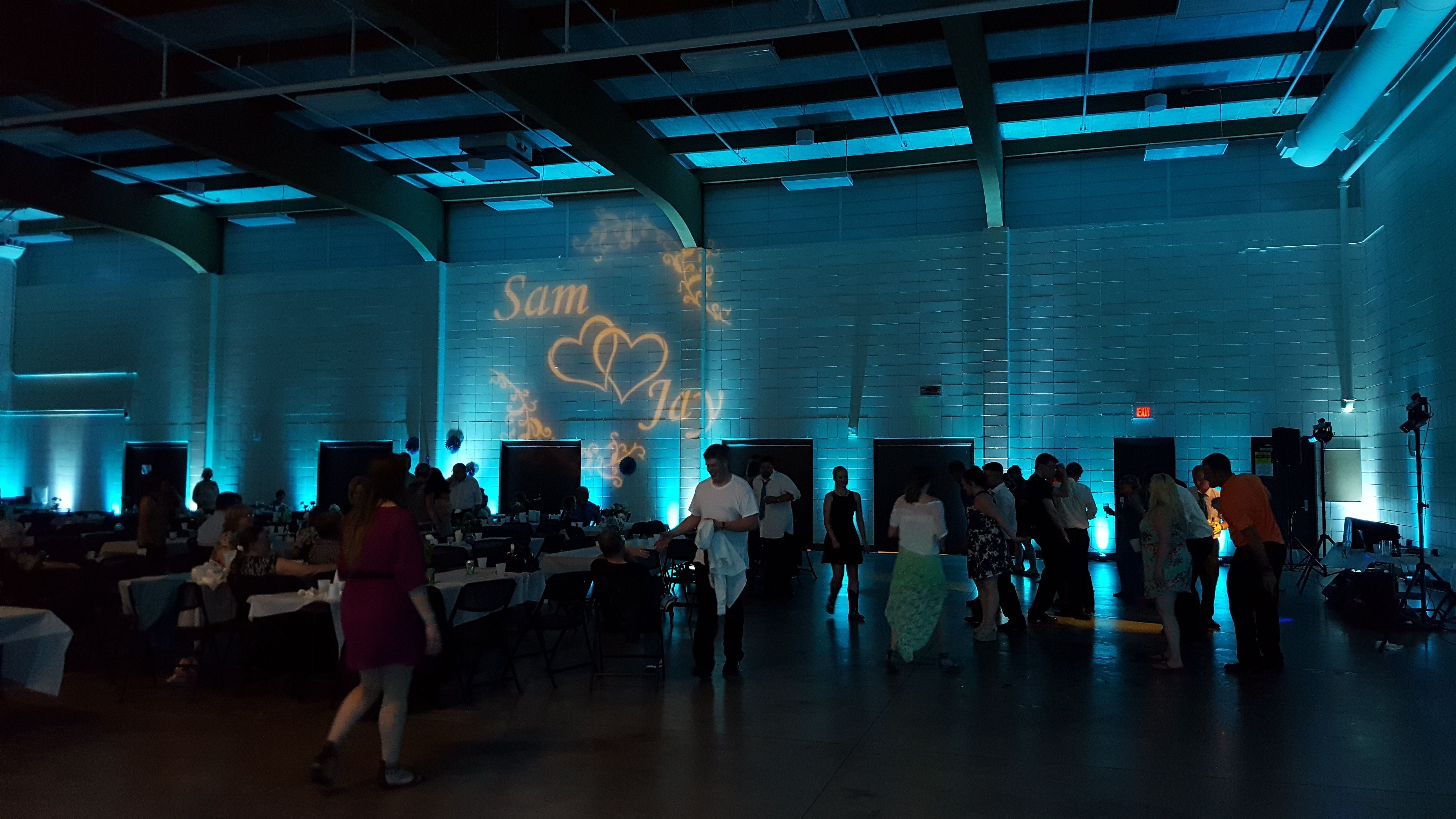 Wedding lighting at the Duluth Armory with a monogram.