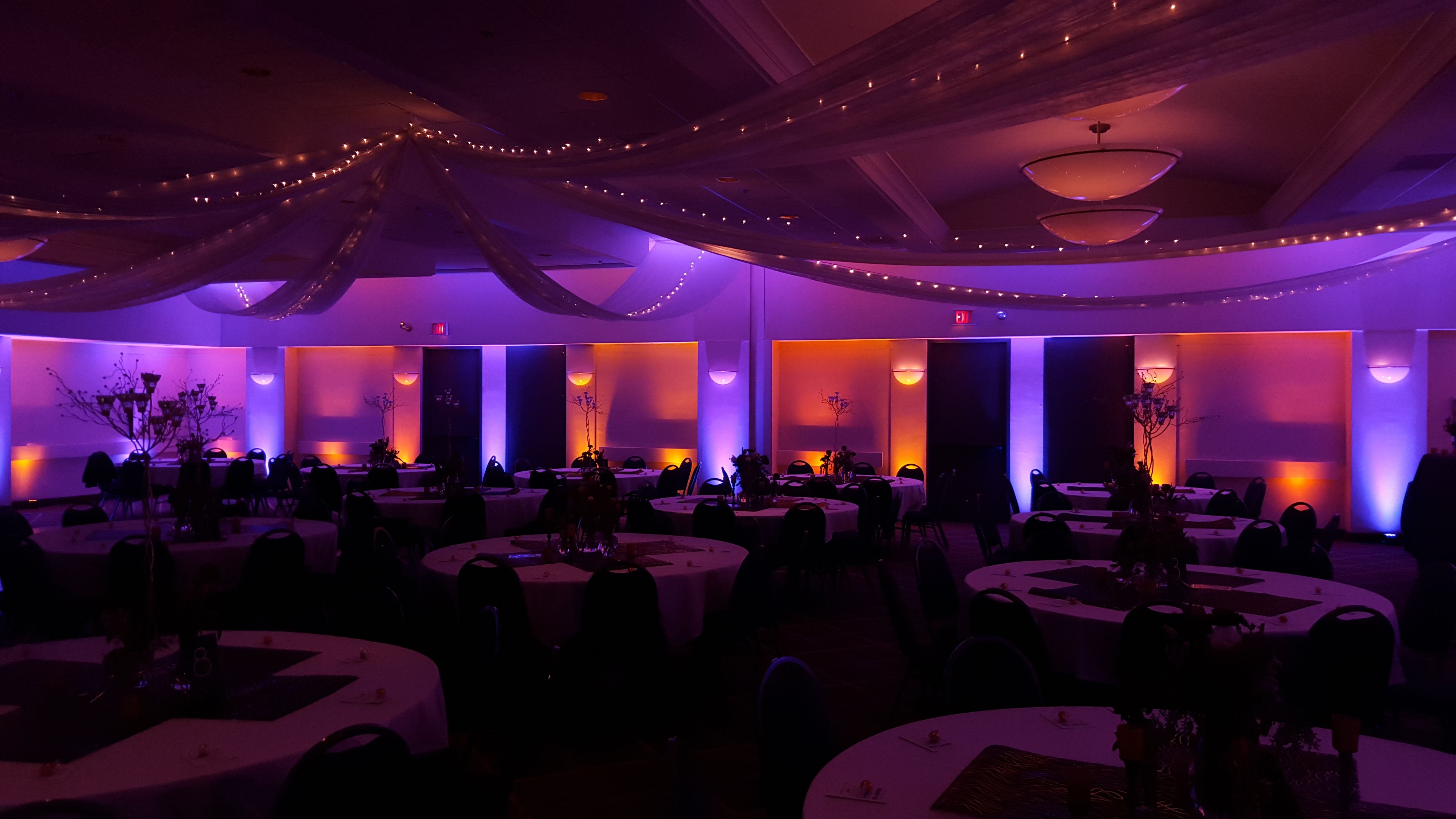 Radisson, Duluth wedding. Up lighting in orange and purple.