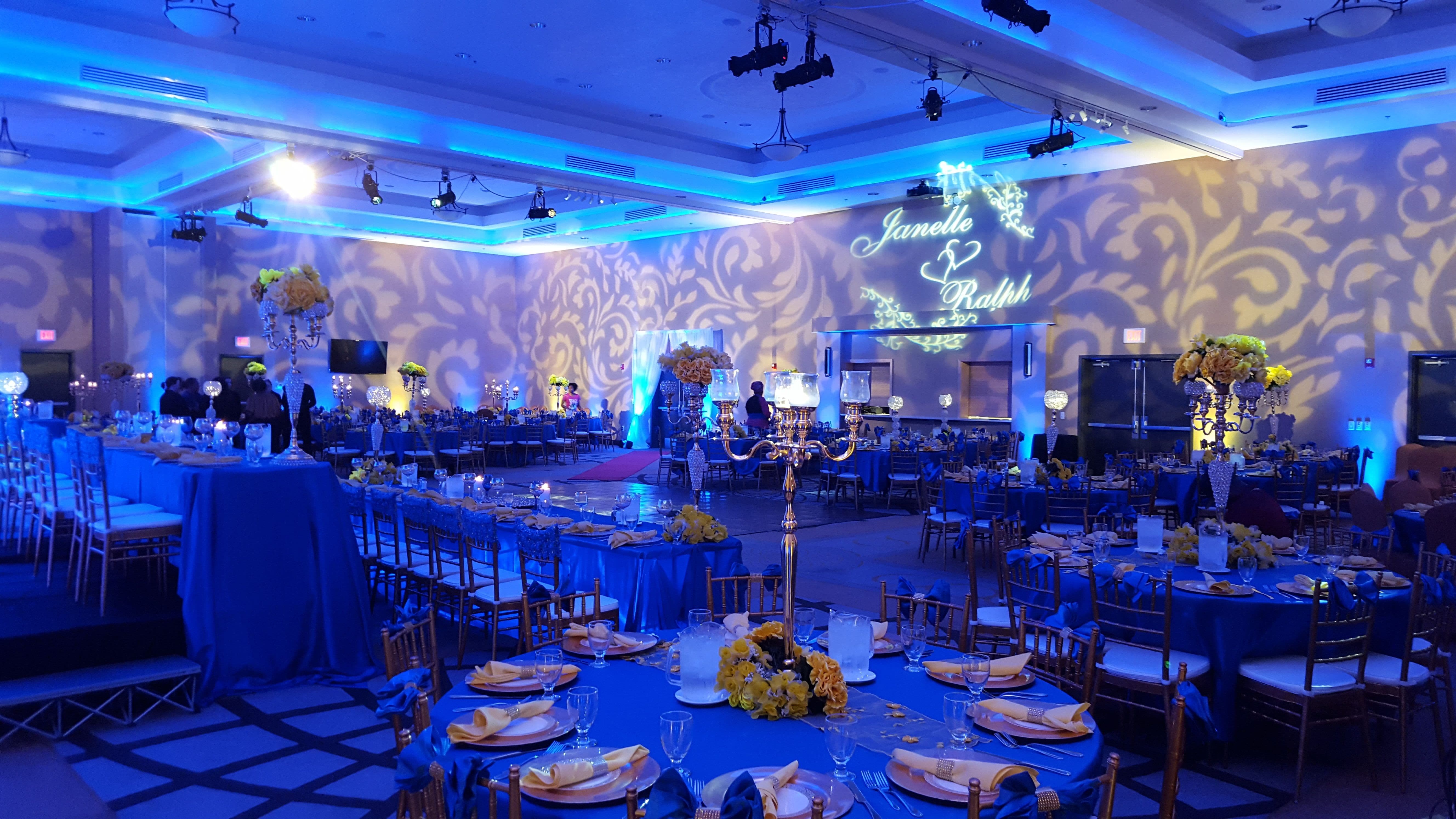 Wedding lighting with patterns on the walls.