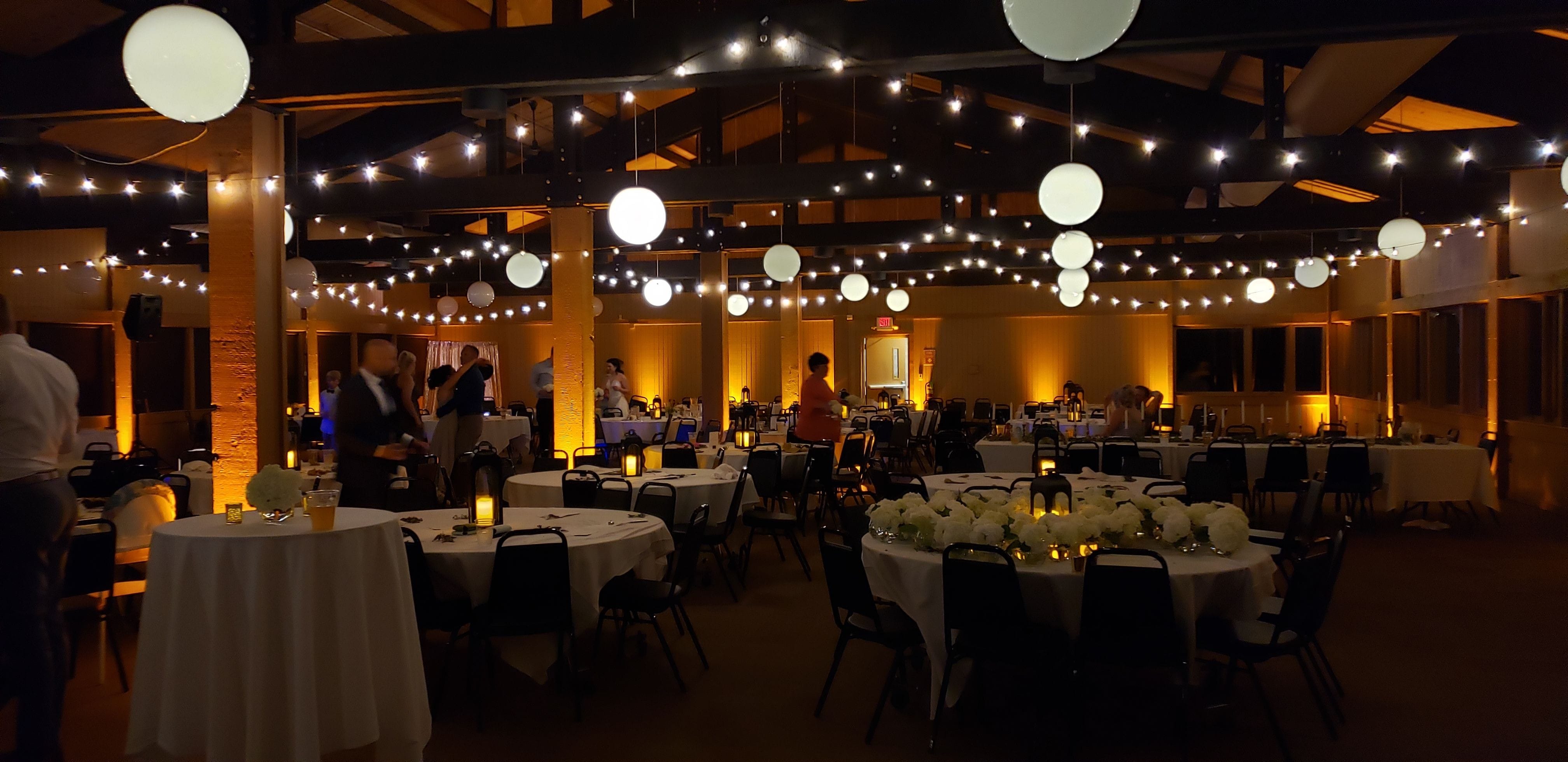 Spirit Mountain, Bear Paw room. Up lighting in amber with bistro for a fall wedding