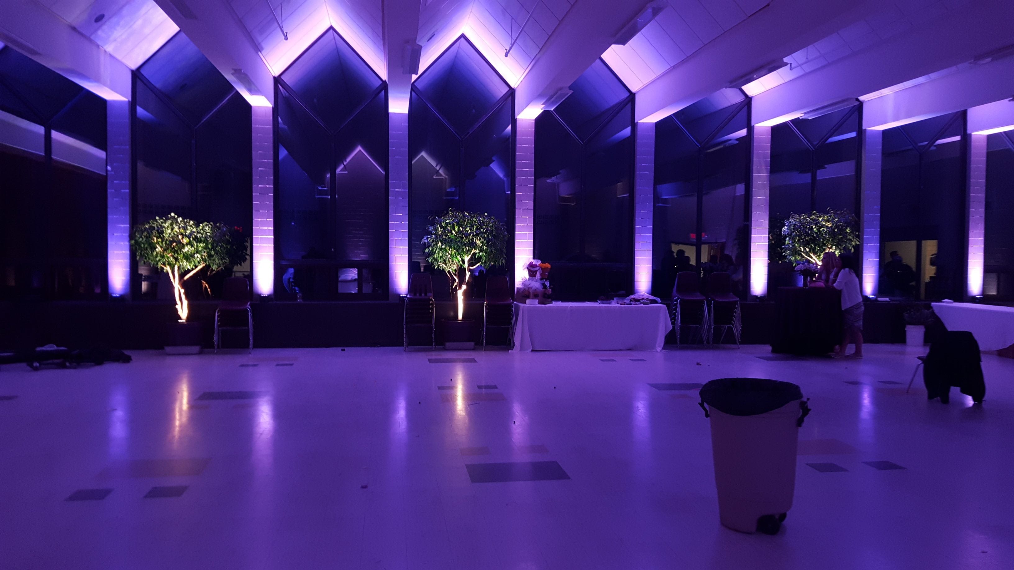 Marshall School cafeteria. Wedding lighting in two tone lavender.