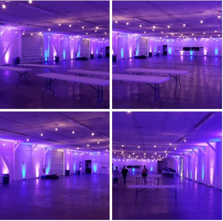 Carlton Fairgrounds wedding lighting. Up lighting in two tone lavender and bistro by Duluth Event Lighting.