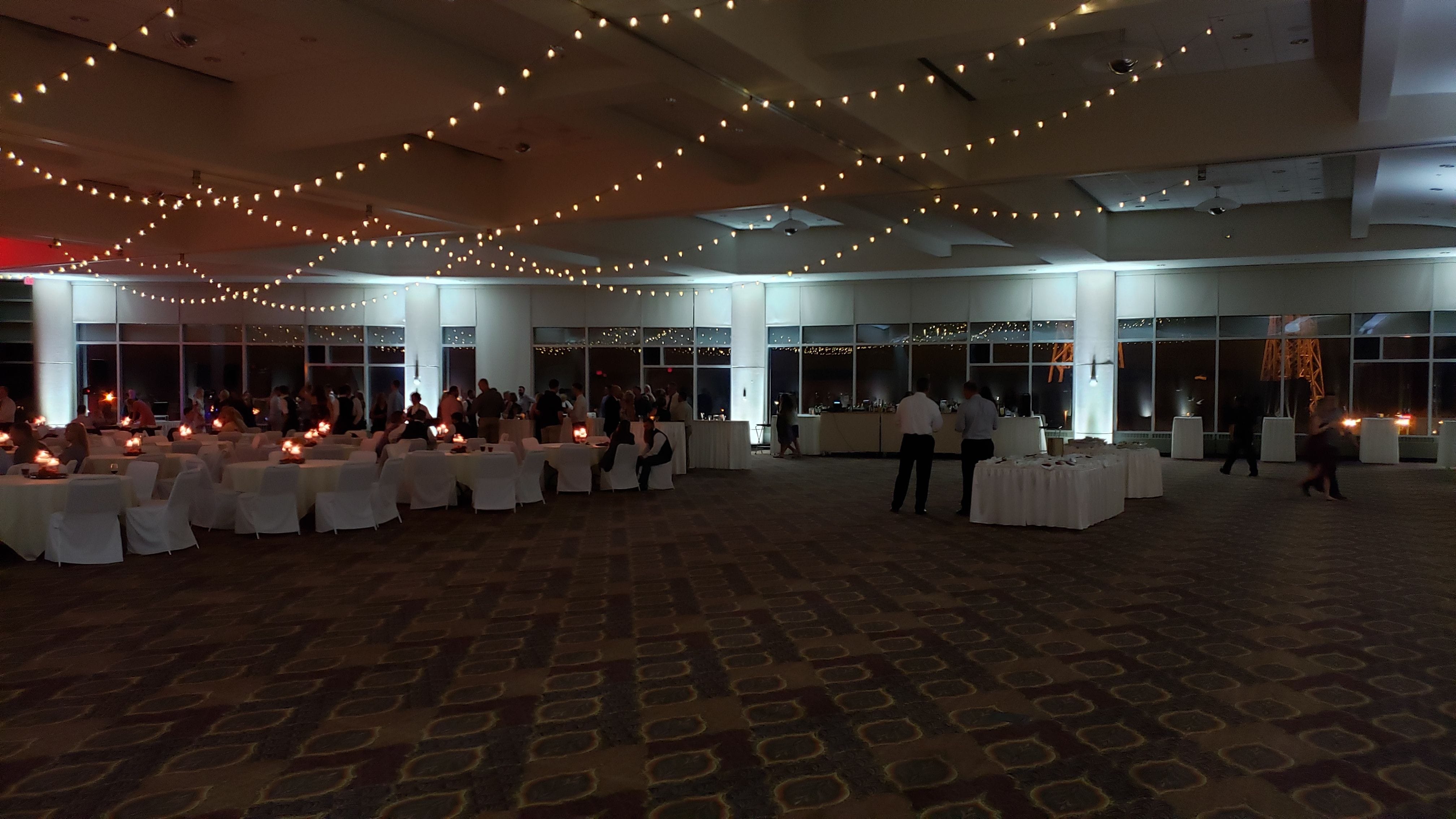 Harbor Side Ballroom at the DECC. Bistro on ceiling with white up lighting.