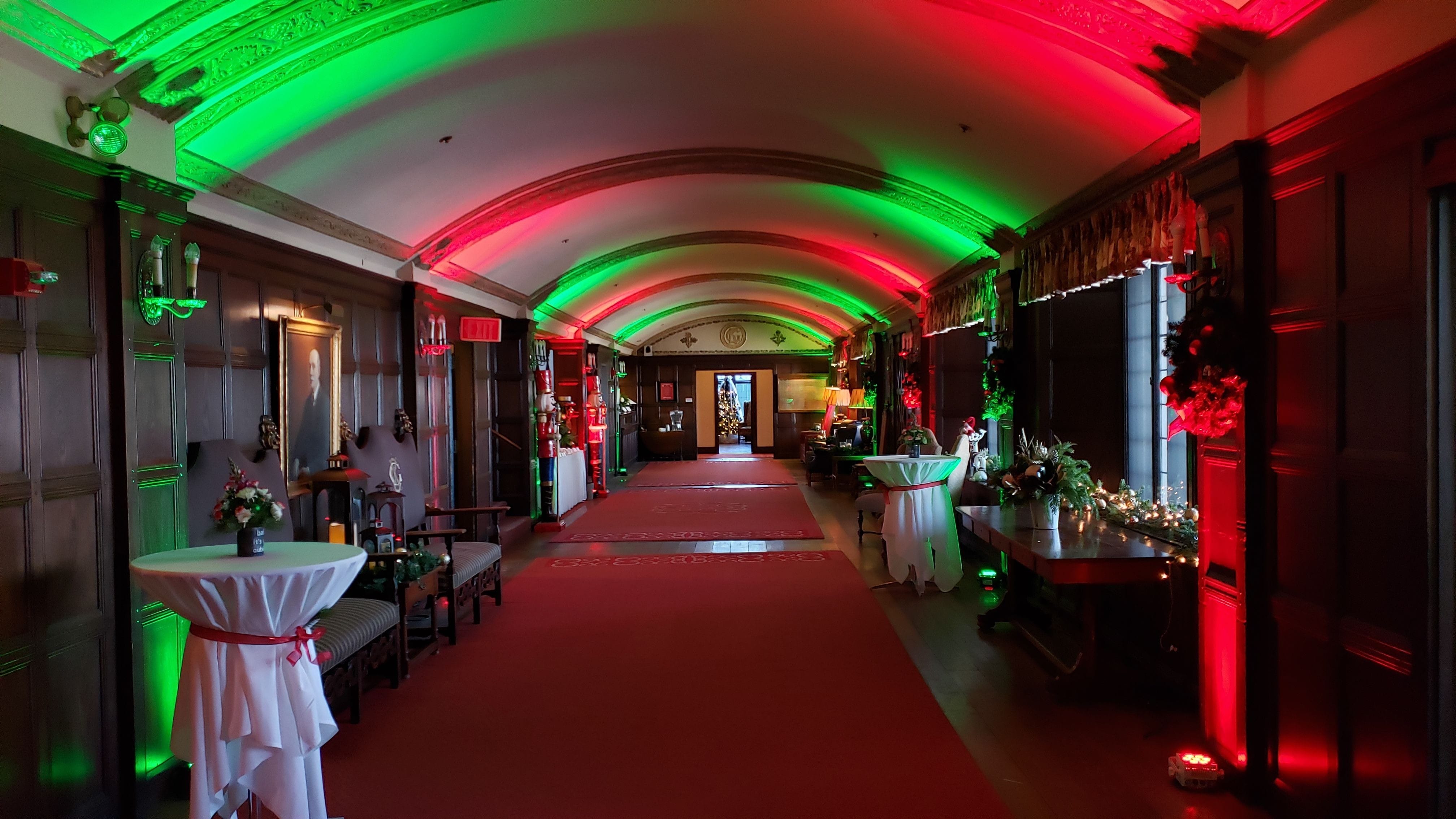 Red and Green Up lighting for Christmas at the Kitchi Gammi Club.