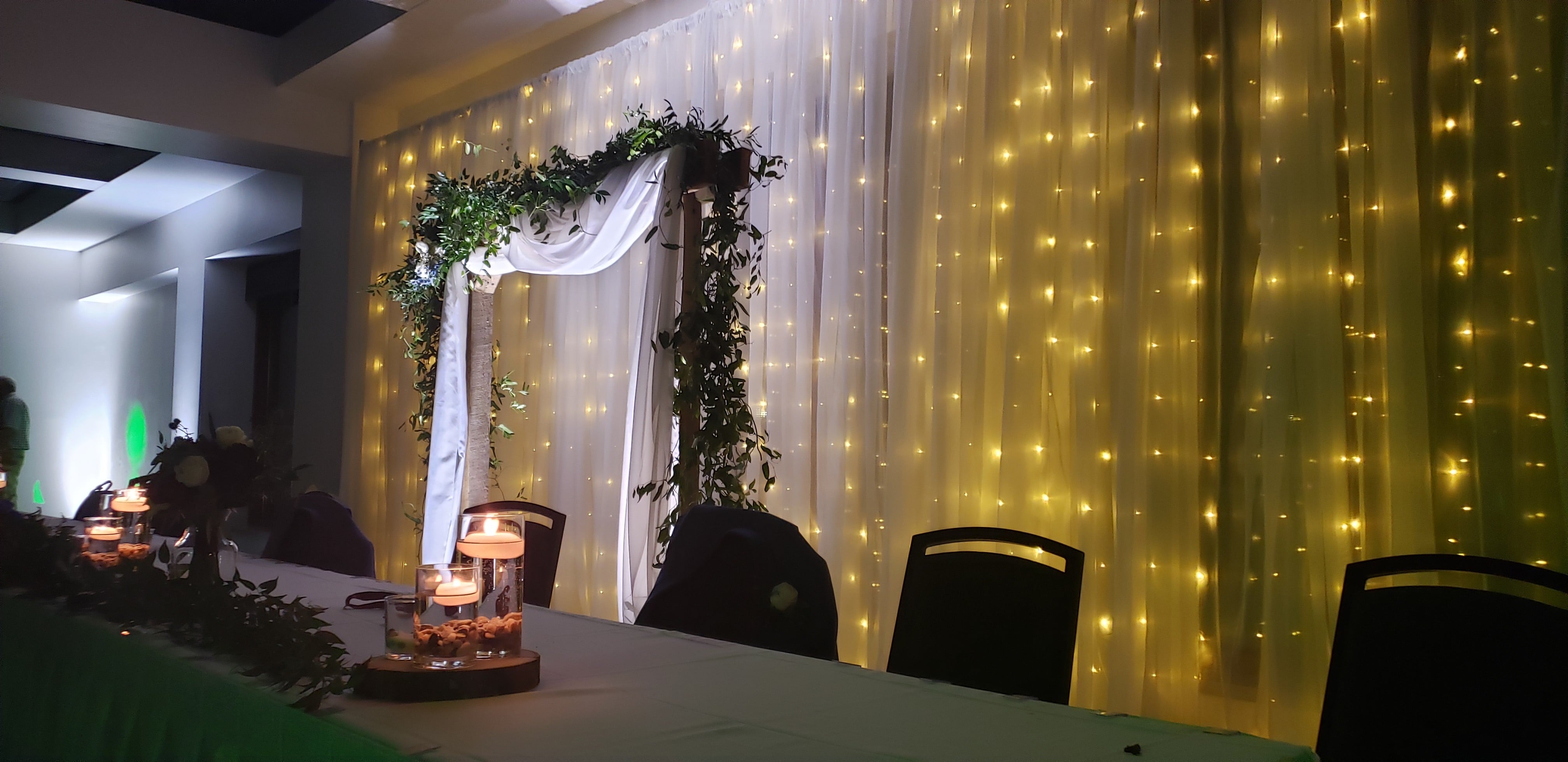 wedding lighting at Pier B with a head table backdrop