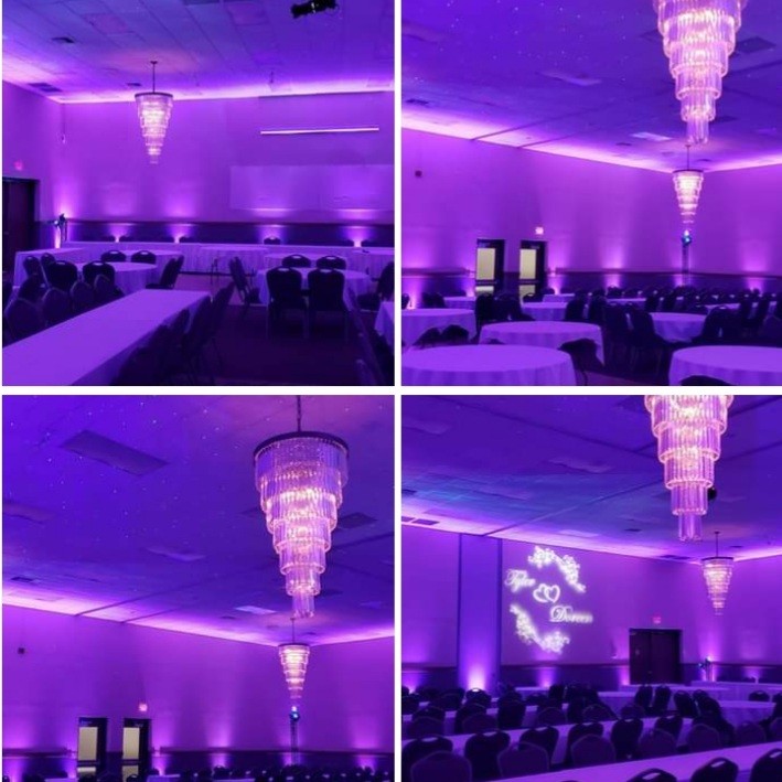 Barker's Island wedding lighting by Duluth Event Lighting. Up lighting in purple and a wedding monogram.