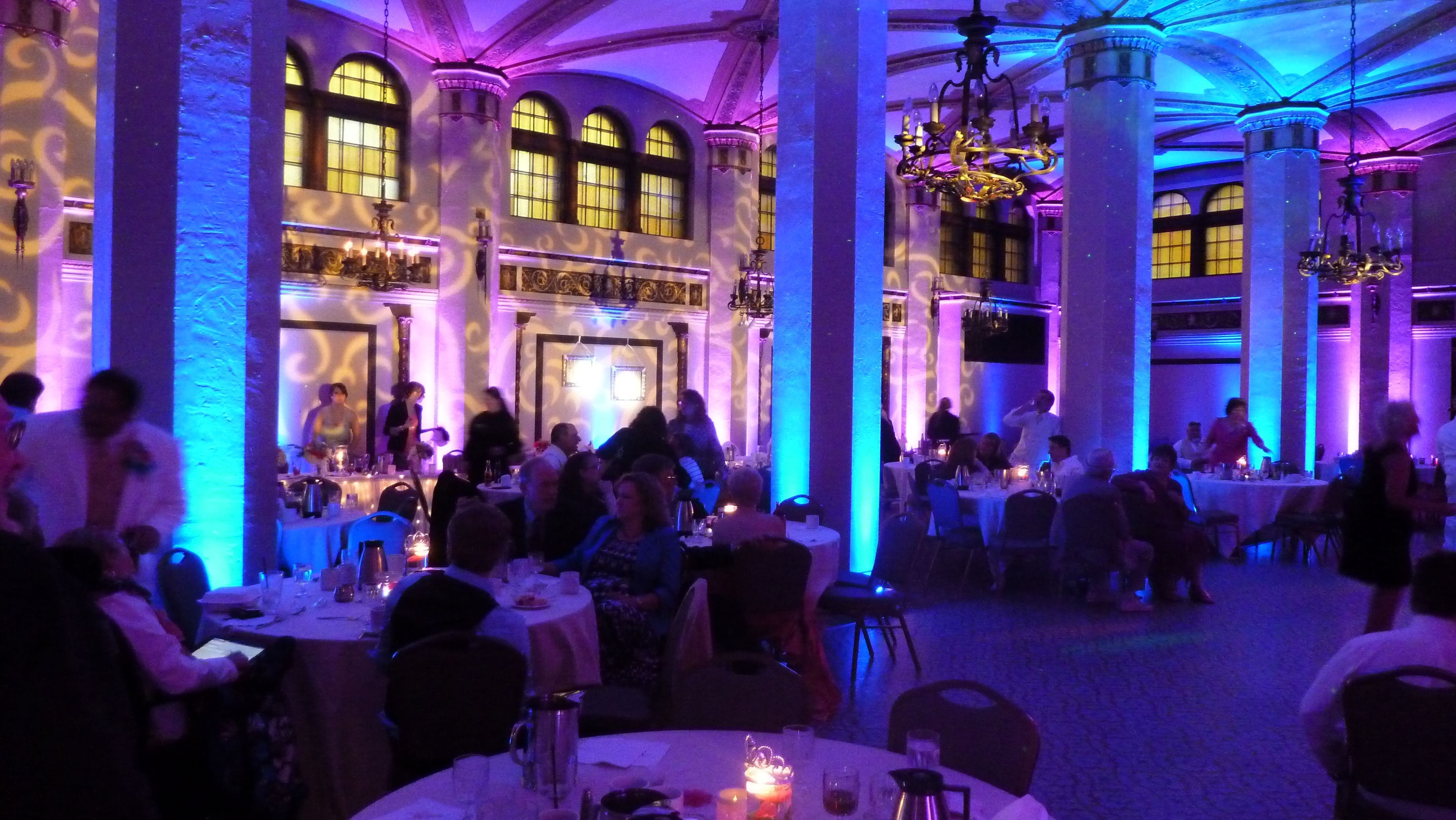 Moorish Room wedding. Up lighting in blue and pink with gobo pattern on wall.