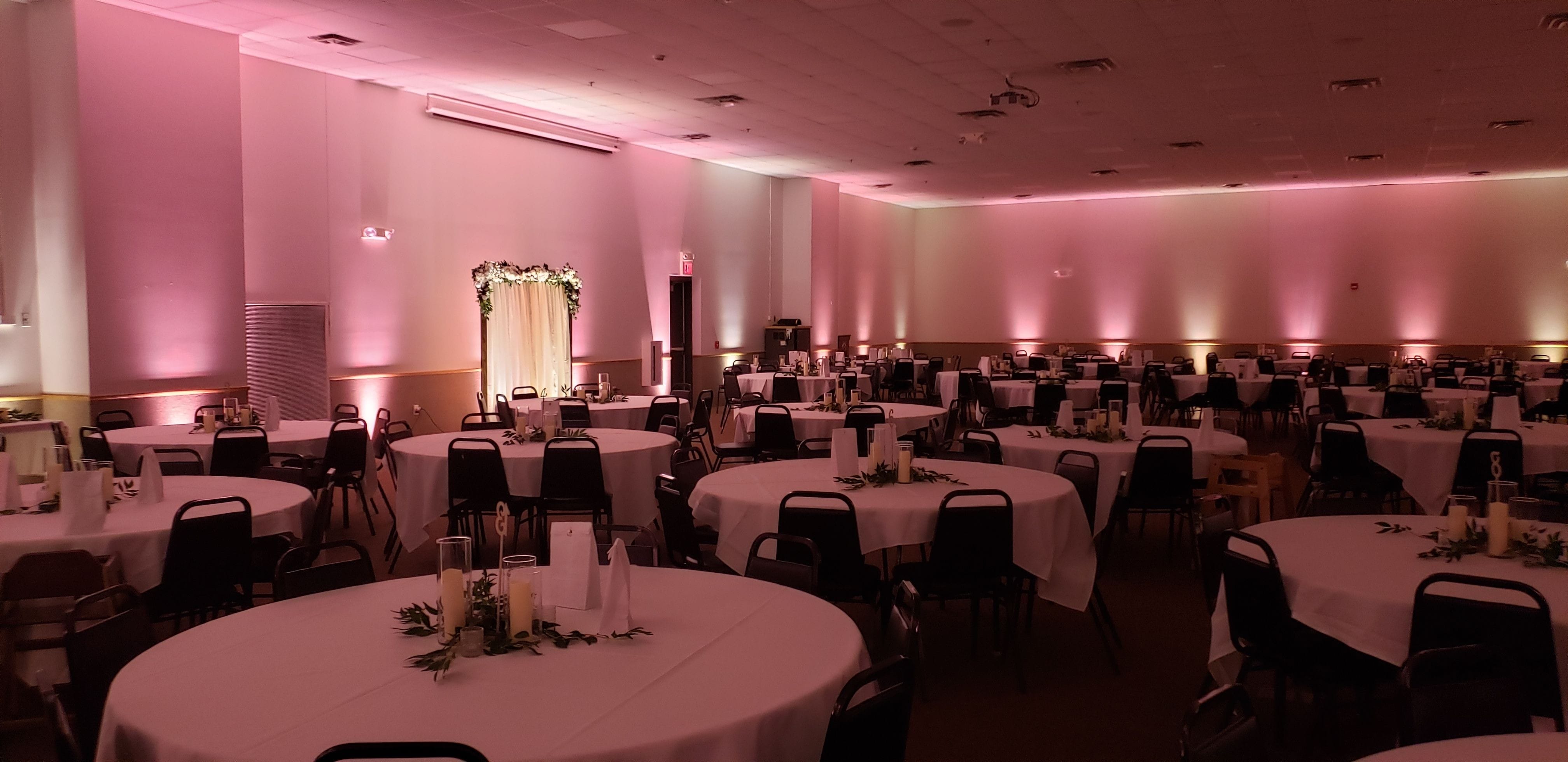 wedding lighting at the AAD Shrine with blush pink and soft white up lighting.