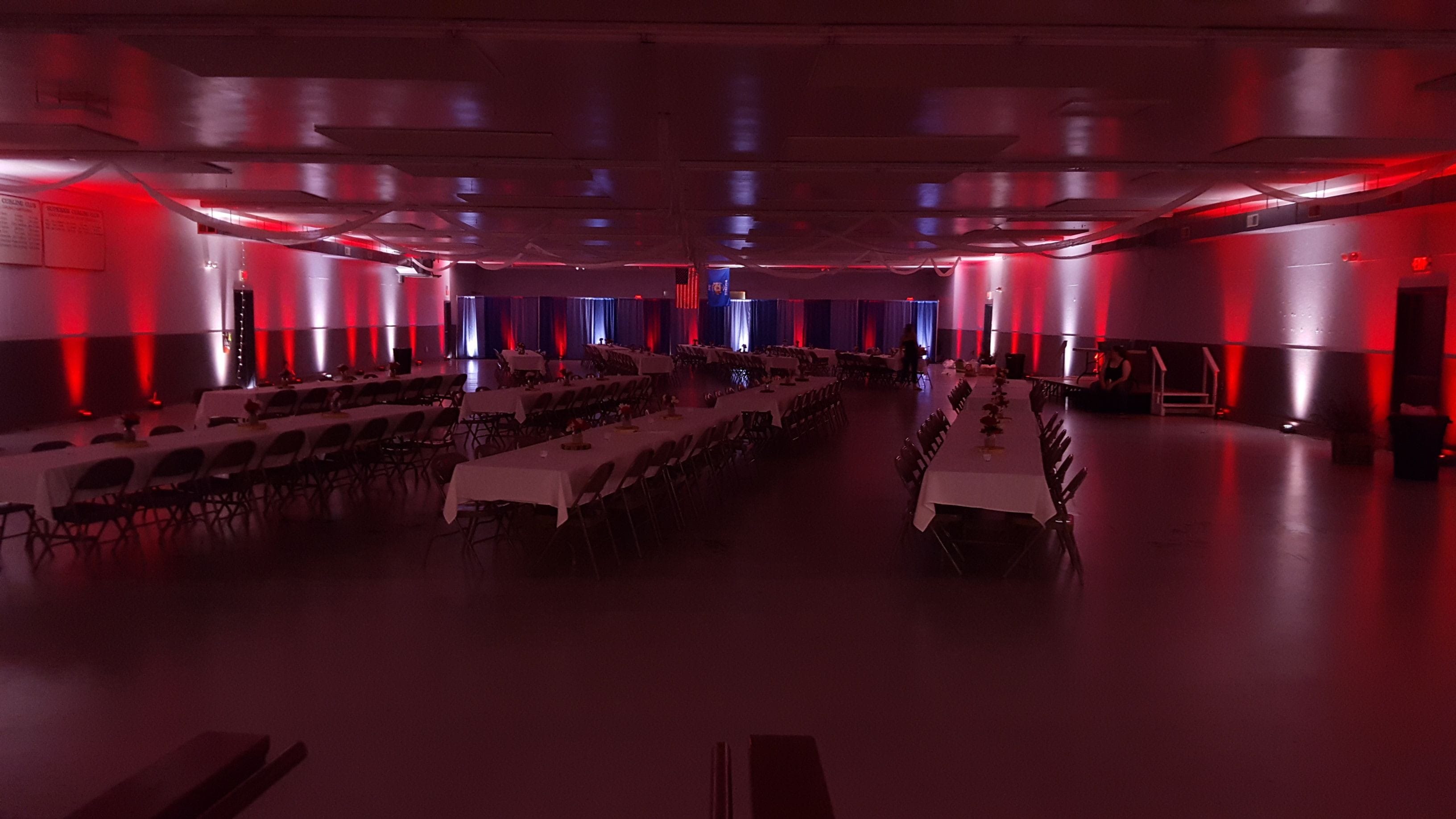 Superior Curling Club.
Up lighting in a dim red and white for a wedding.