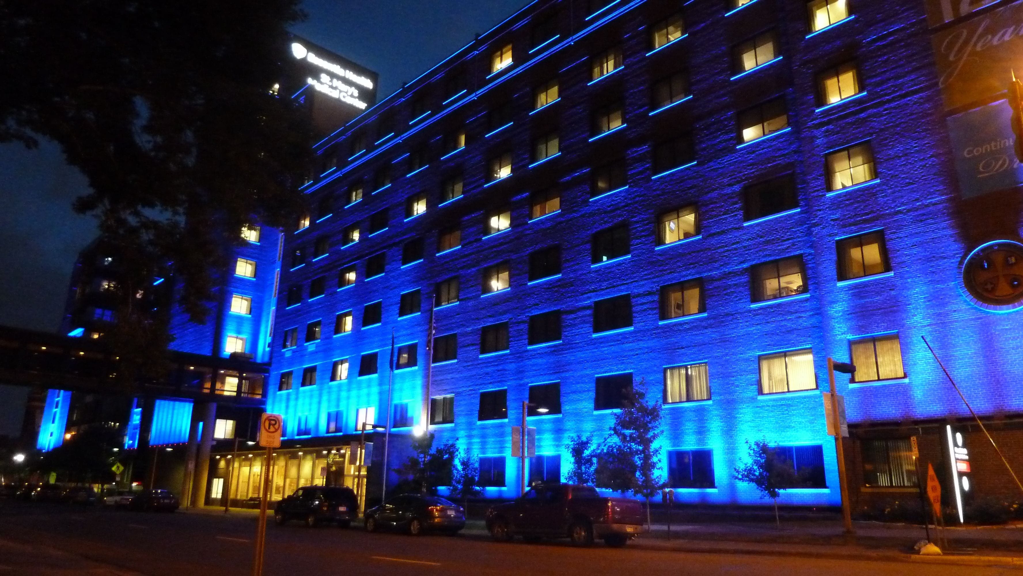 Essentia Health, St. Mary's Clinic bathed in blue lighting.