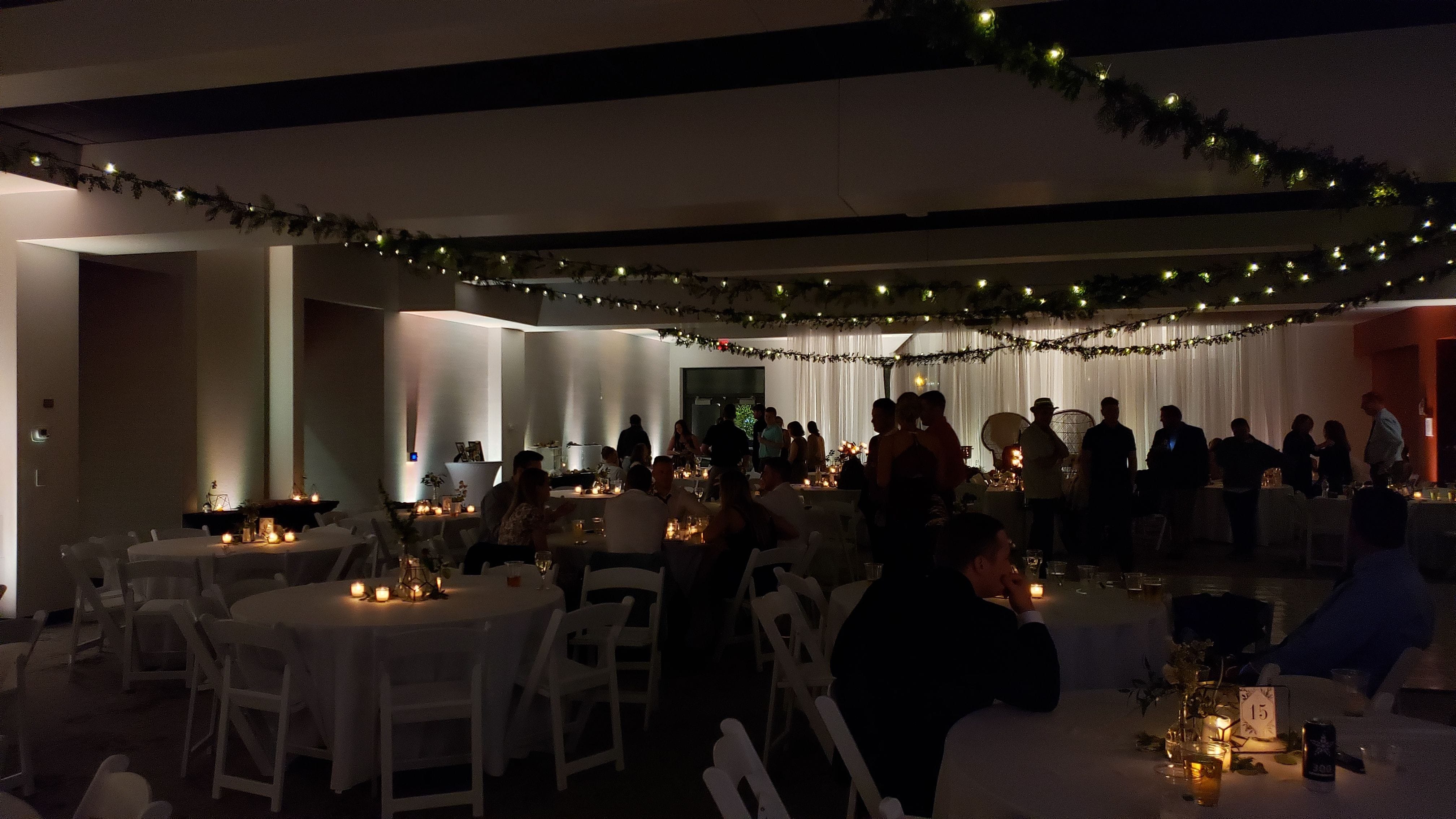 Pier B wedding. Up lighting in soft white. decor by @thevaultduluth