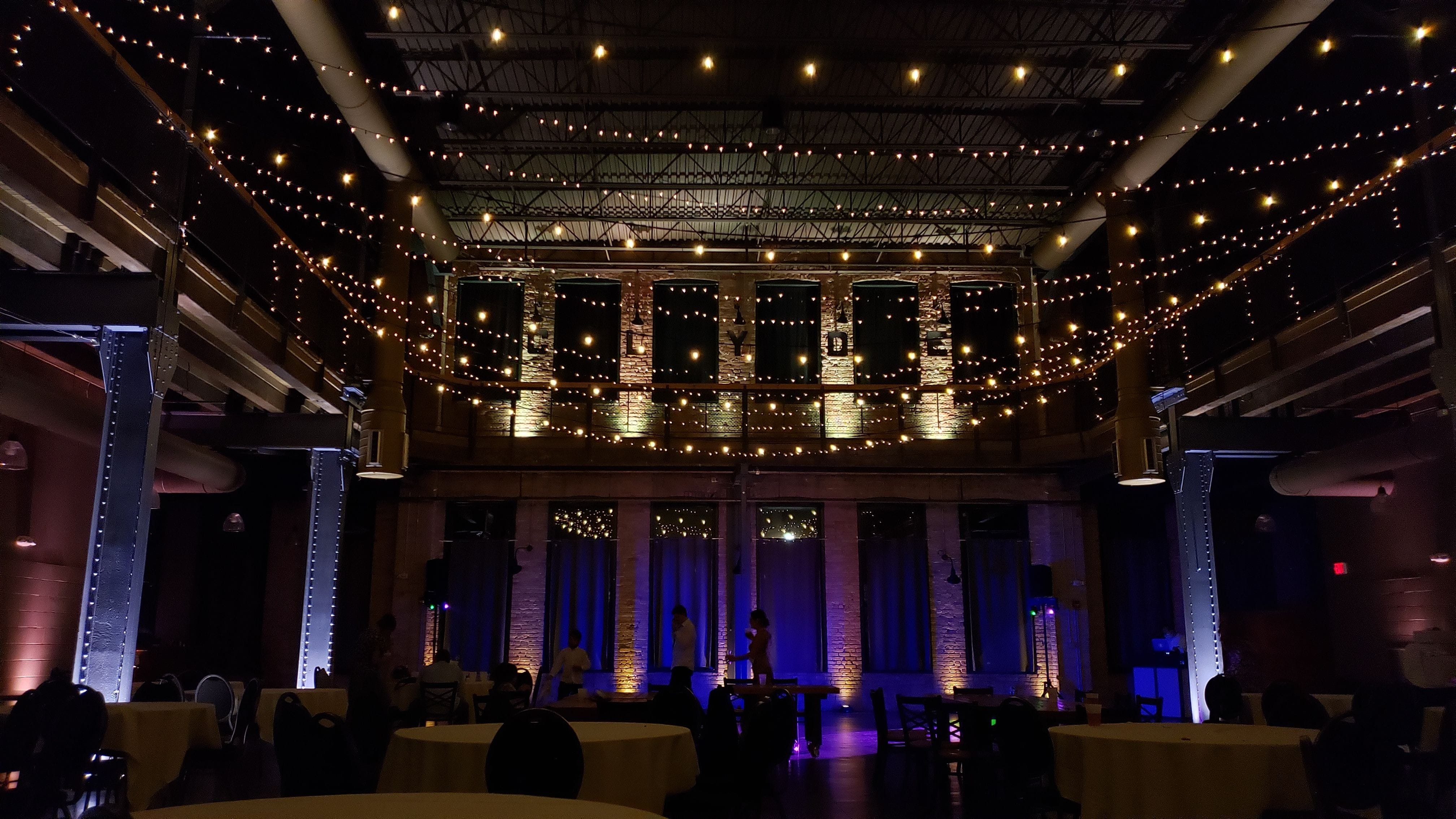 wedding lighting at Clyde Iron Works with bistro and Christmas Lights provided by Duluth Event Lighting.