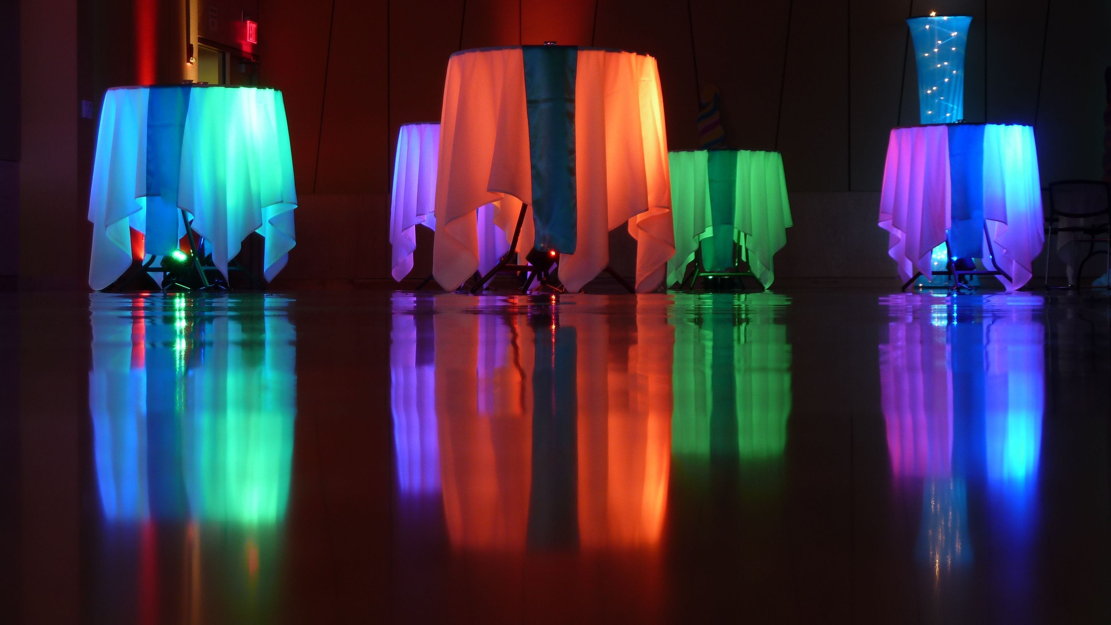 Glowing clocktail tables for a prom at UWS, Yellowjackt Union.