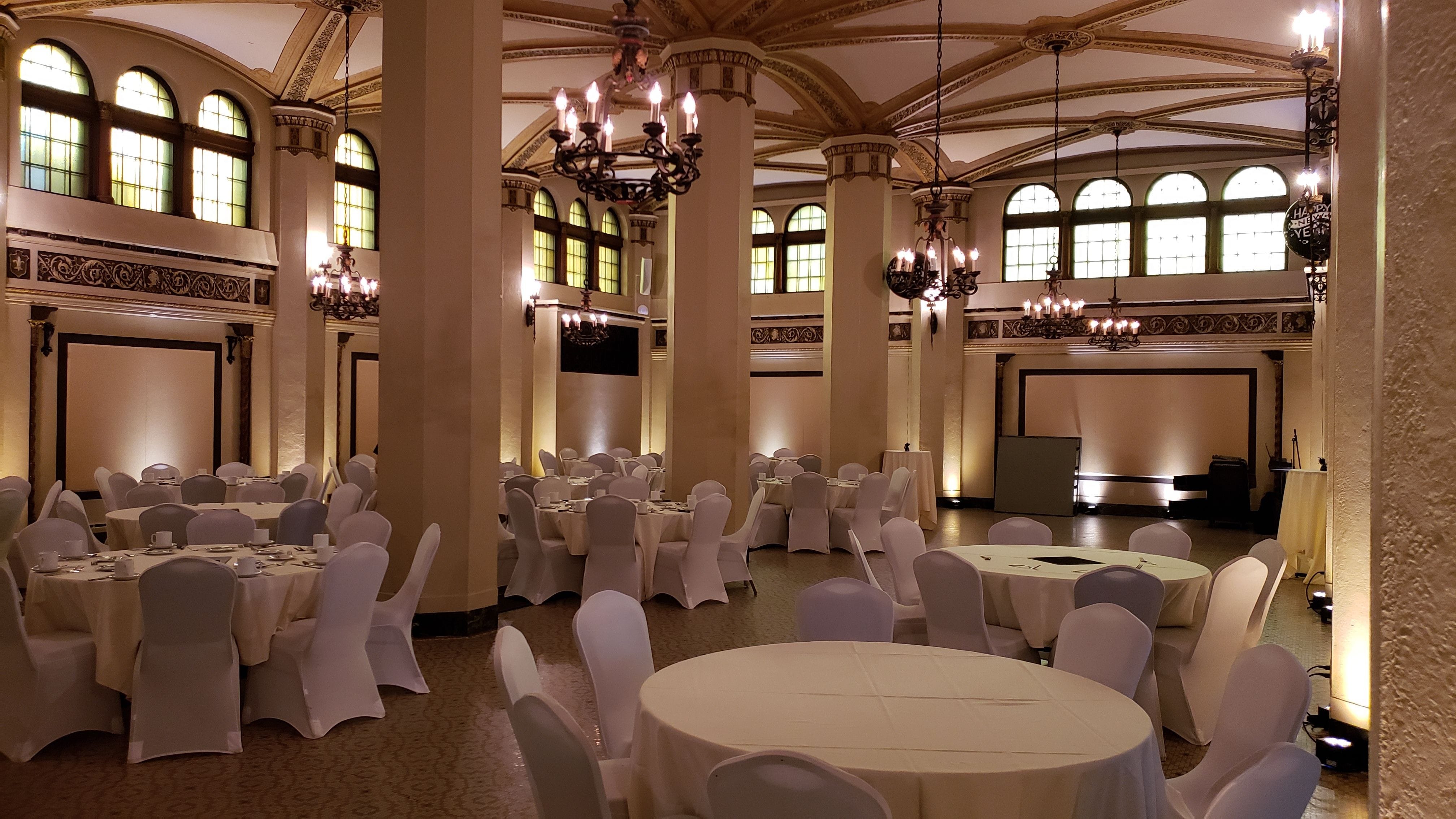 Wedding lighting in the Moorish Room at Greysolon Plaza. Up lighting in soft gold and soft white.