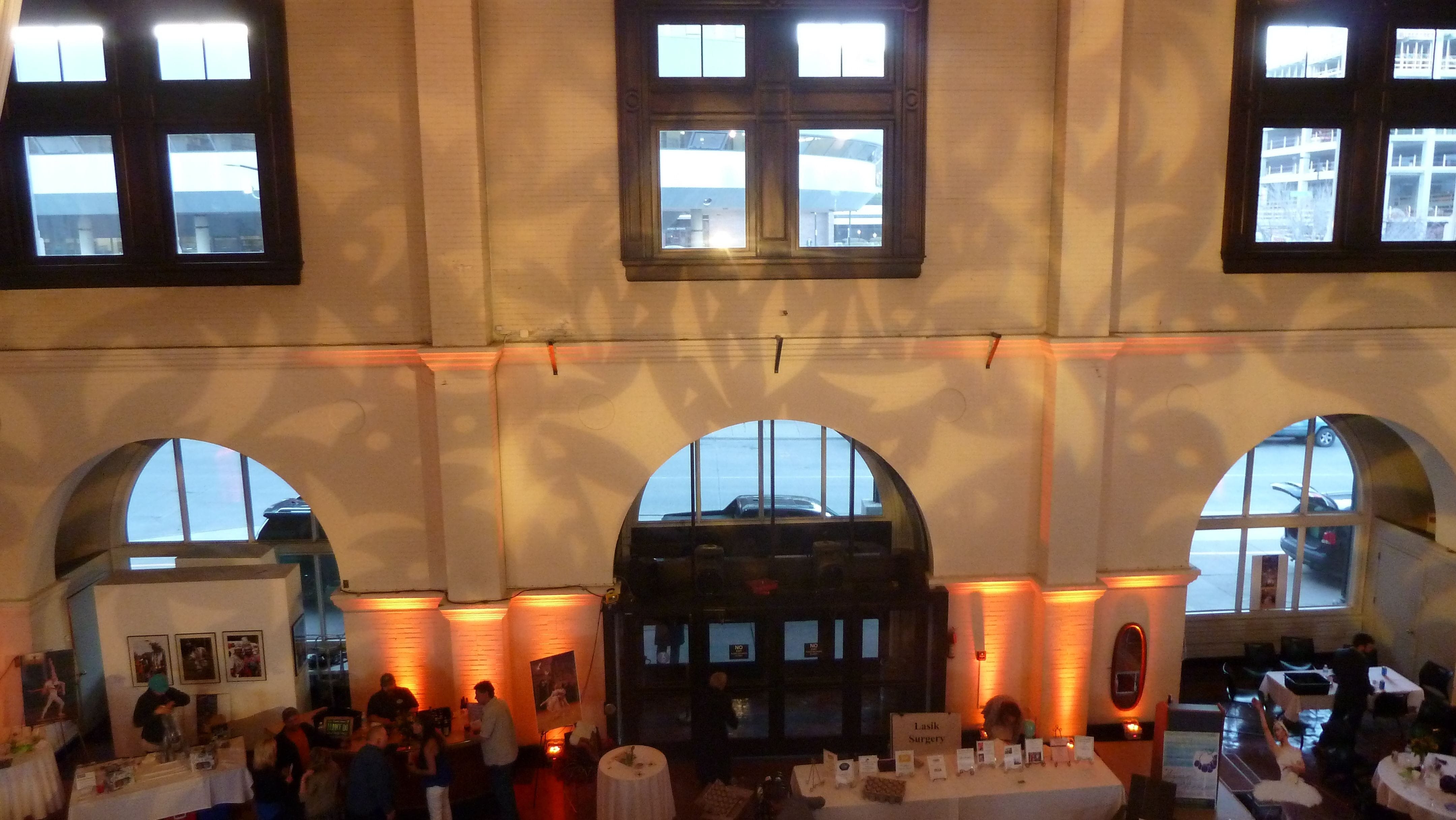 Up lighting in orange with gobos on the walls in the Depot Great Hall.