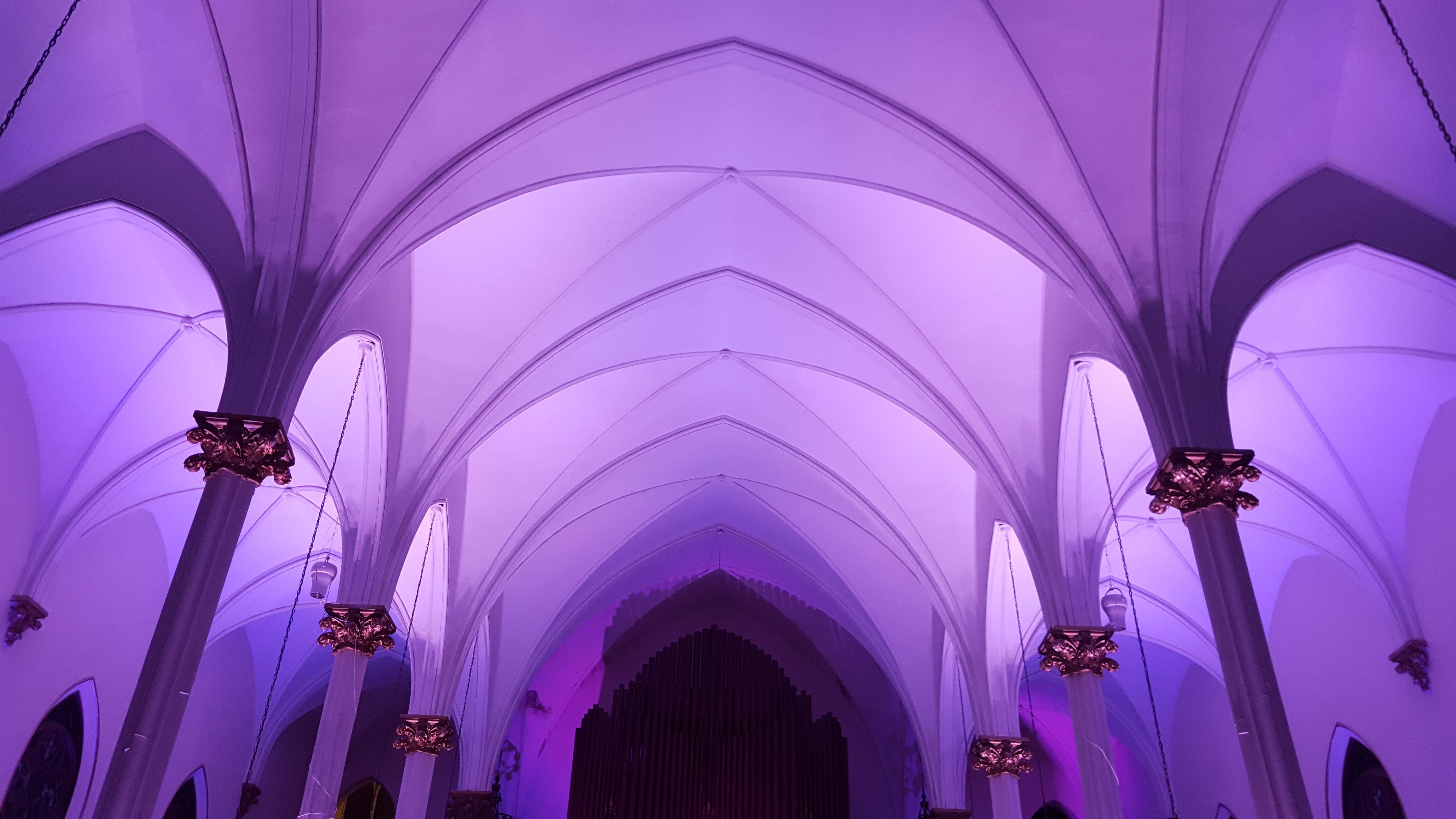 Sacred Heart Music Center. Up lighting in lavender.