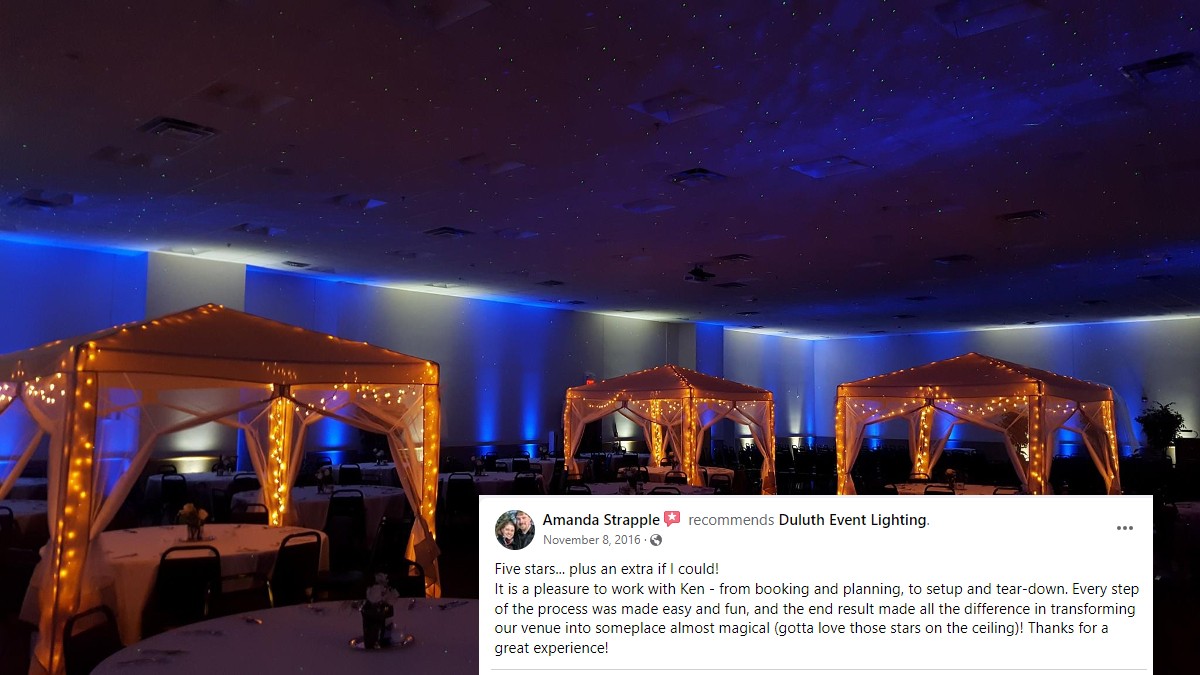 AAD Shrine wedding lighting with blue and white up lighting with stars and Northern Lights dancing on the ceiling. 