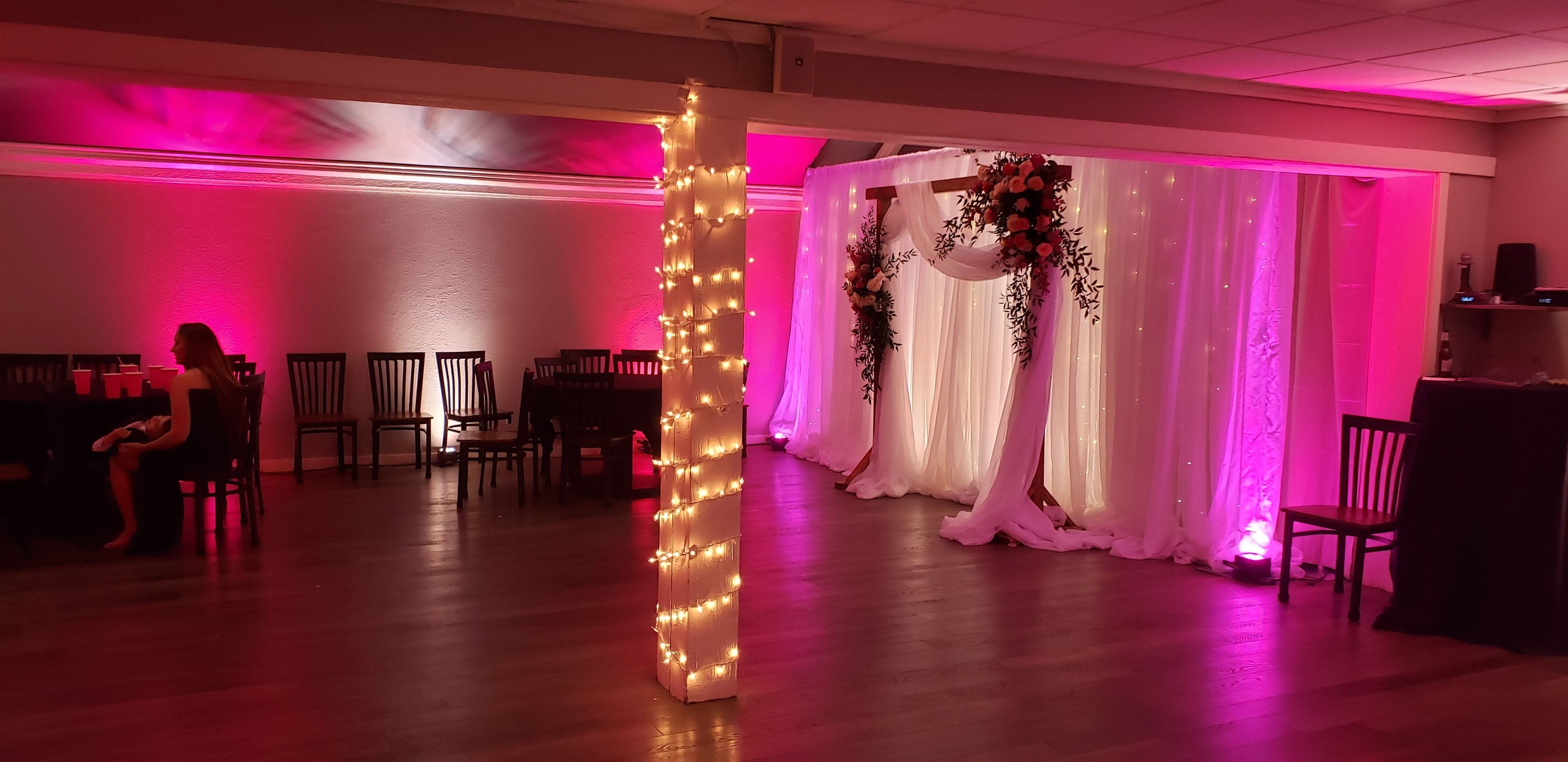 wedding lighting at Ridgeview Country Club. Up lighting in hot pink and white by Duluth Event Lighting.