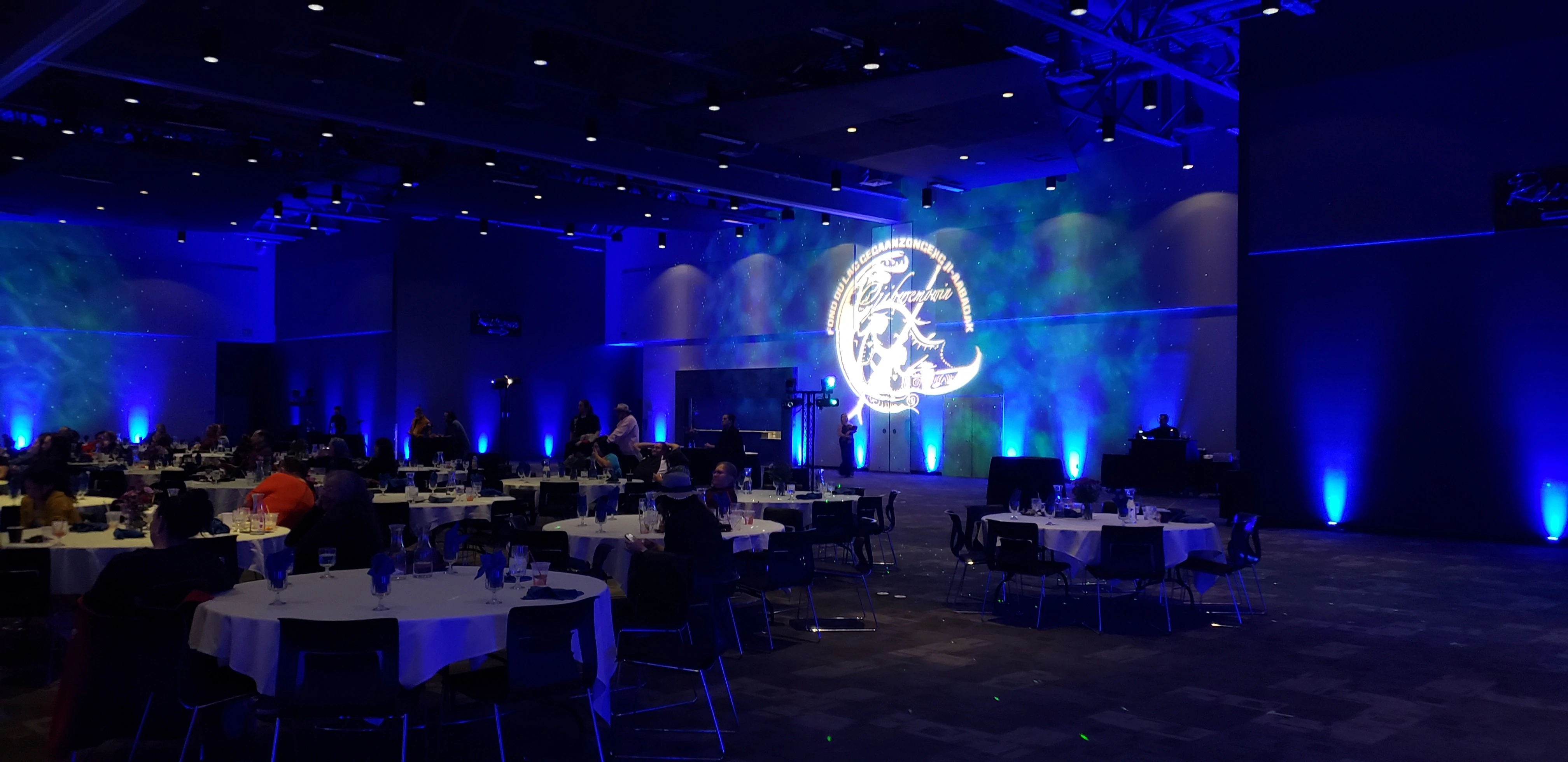 Northern Lights on the walls of the Otter Creek Convention Center at Black Bear Casino with blue up lighting by Duluth Event Lighting